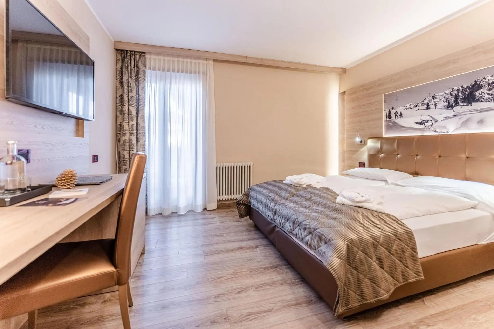 Bed in Tevini Dolomites Charming Hotel