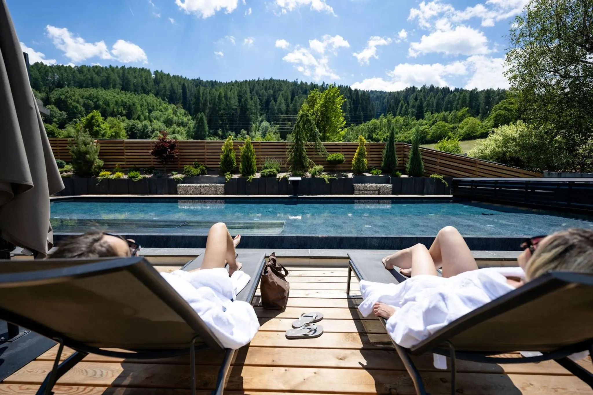 Swimming pool in Tevini Dolomites Charming Hotel