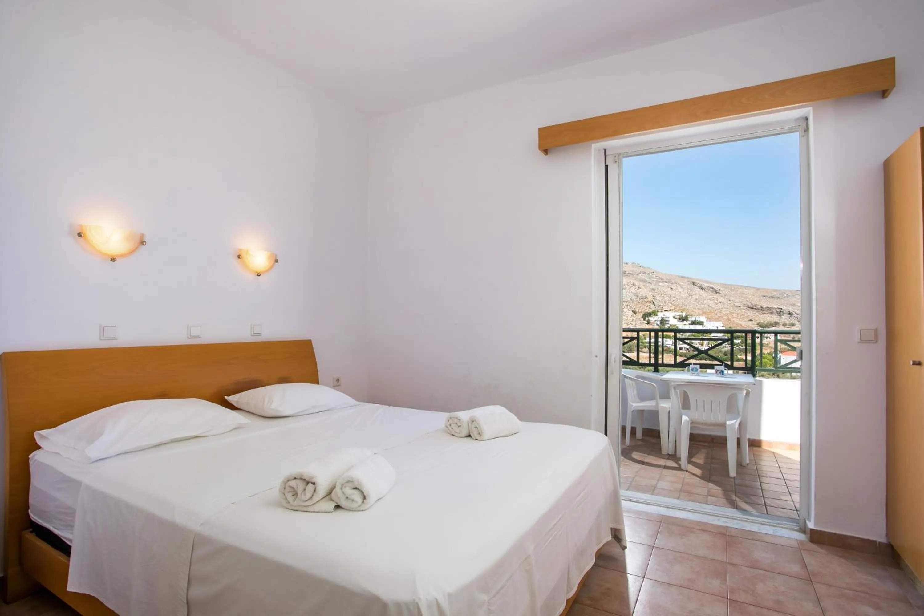 Bed in Lambis Studios & Apartments