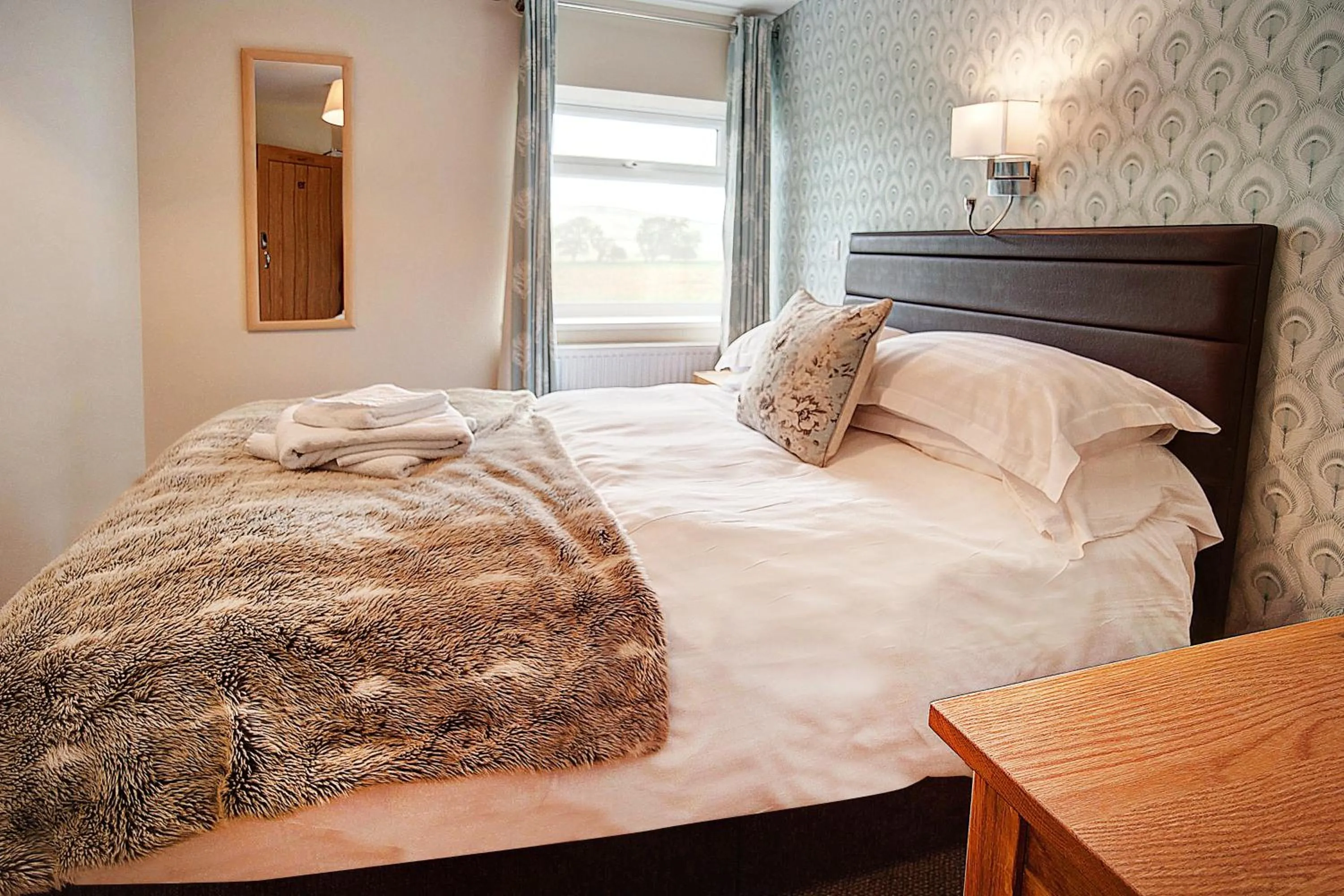 Bed in The Twice Brewed Inn