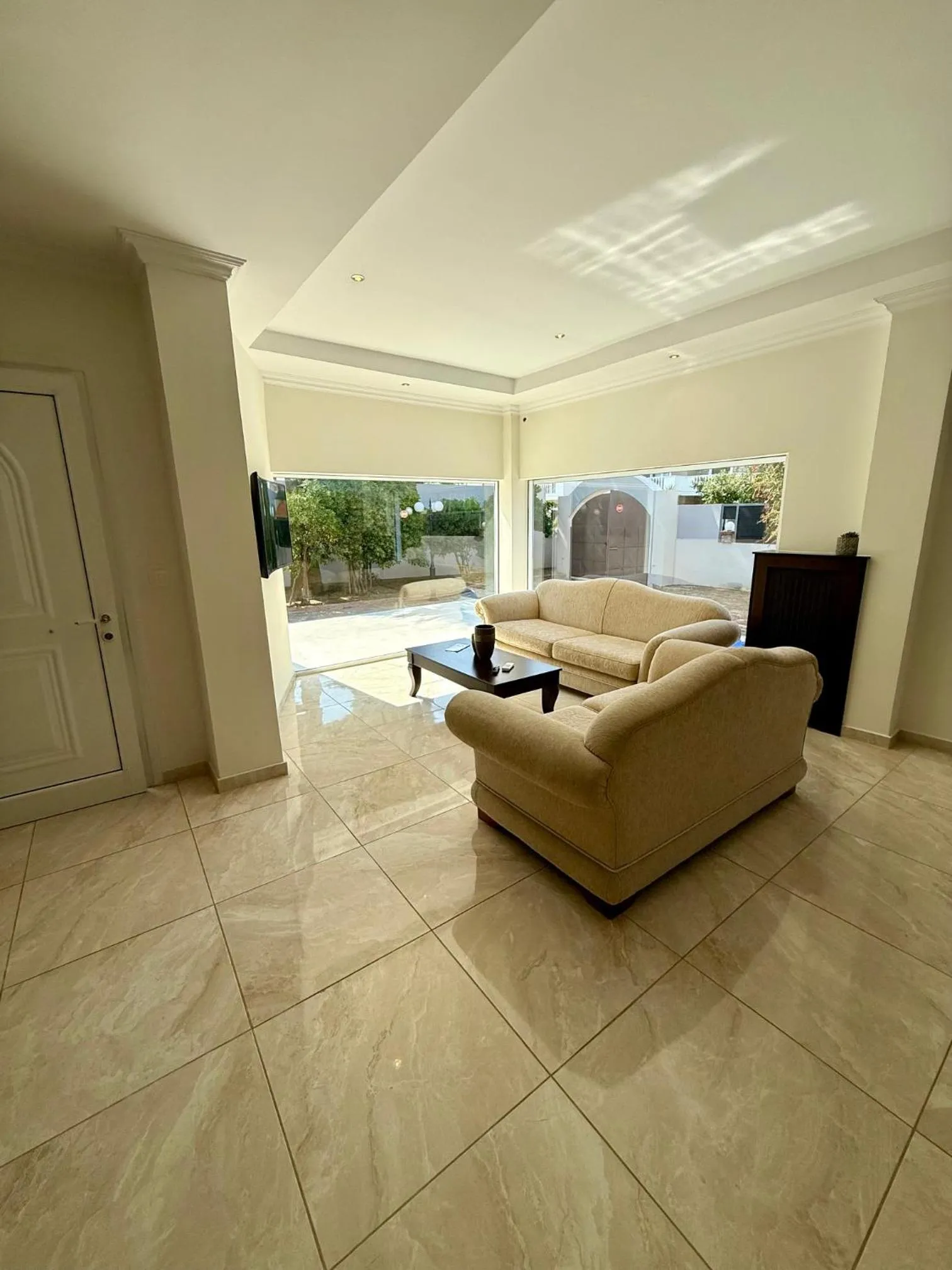 Living room in Paradise Apartments