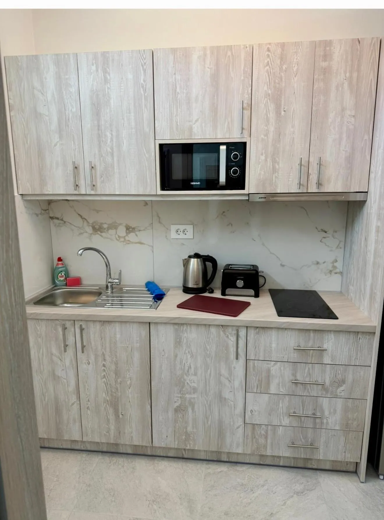 Kitchen or kitchenette in Paradise Apartments