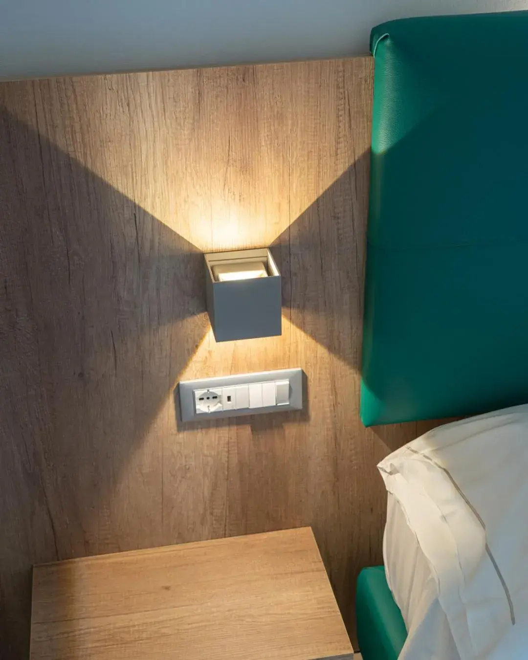 Bed in Hotel San Teodoro Bed in Hotel San Teodoro