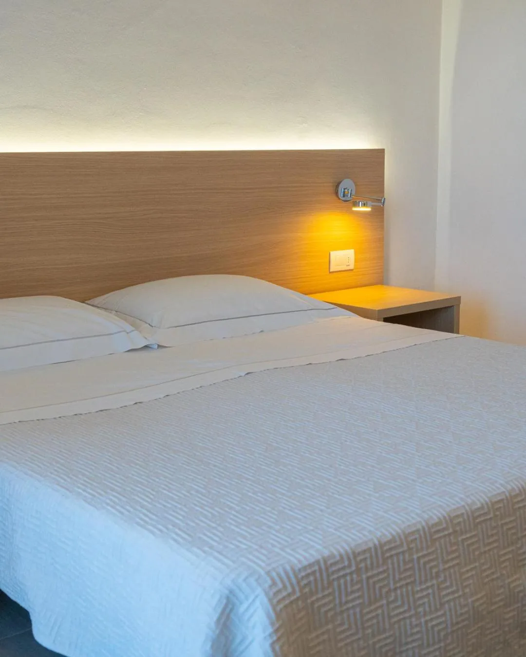 Bed in Hotel San Teodoro