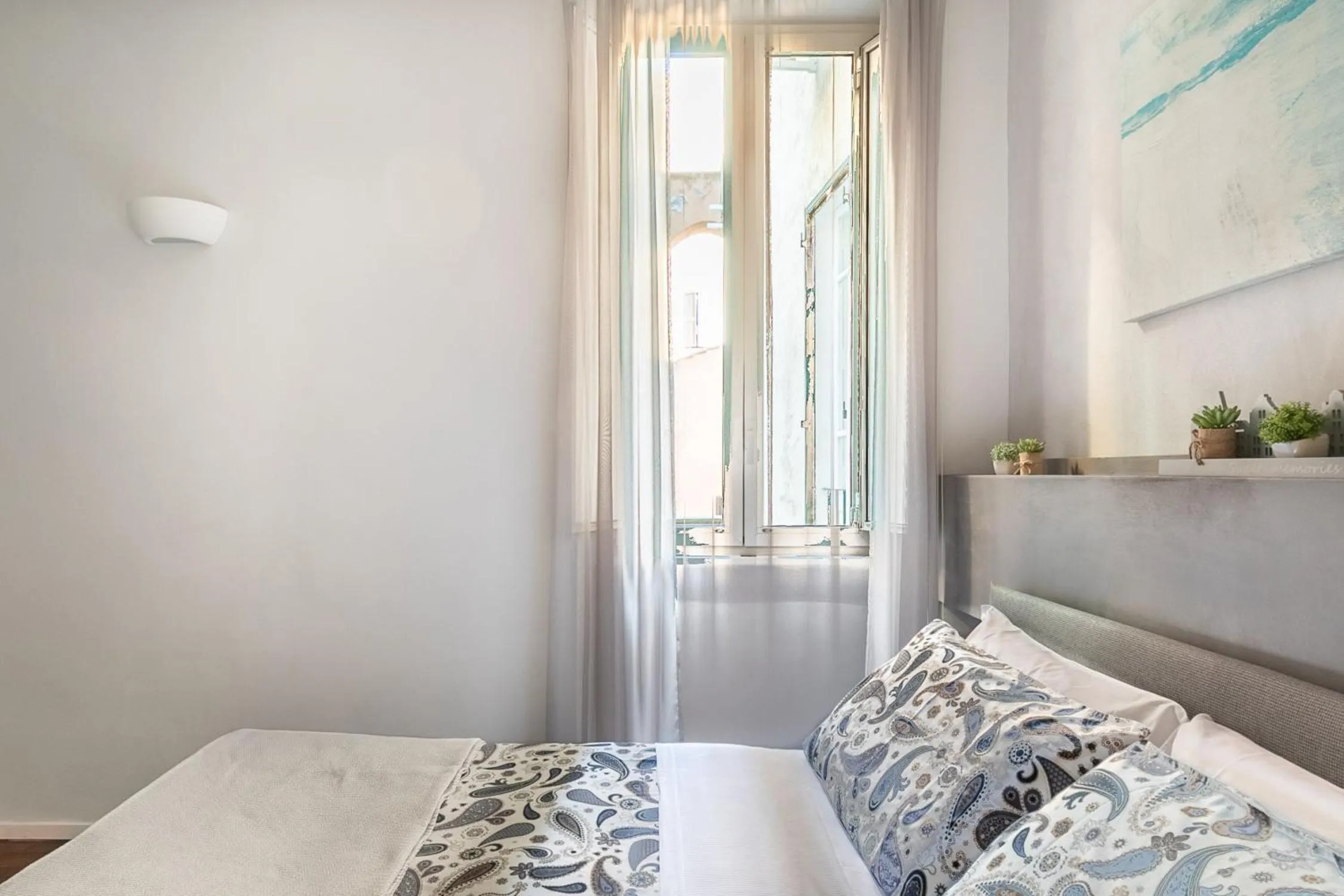 Photo of the whole room, Bed in Living RHome - Condotti Apartment