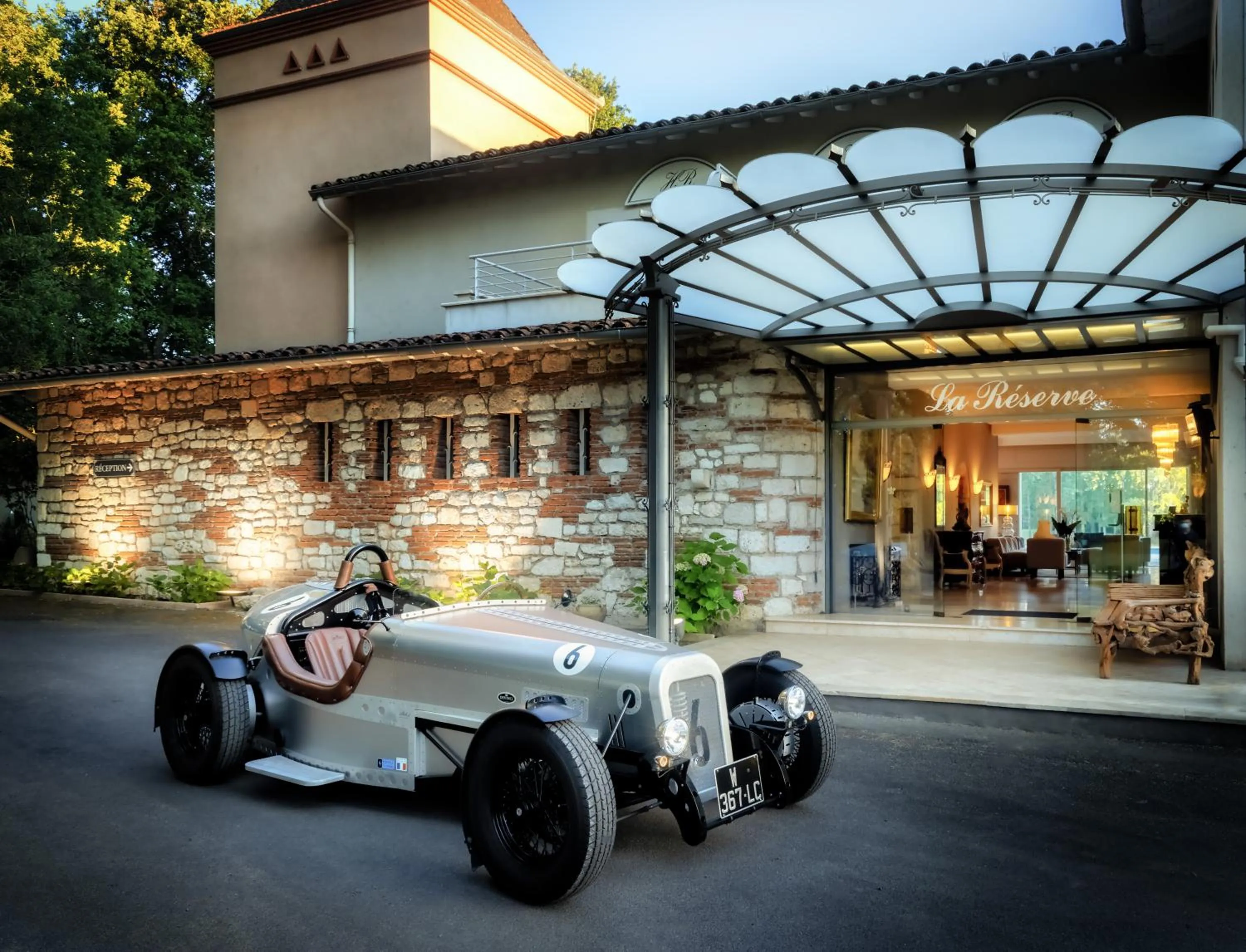 Property building in Relais & Châteaux Hôtel La Réserve