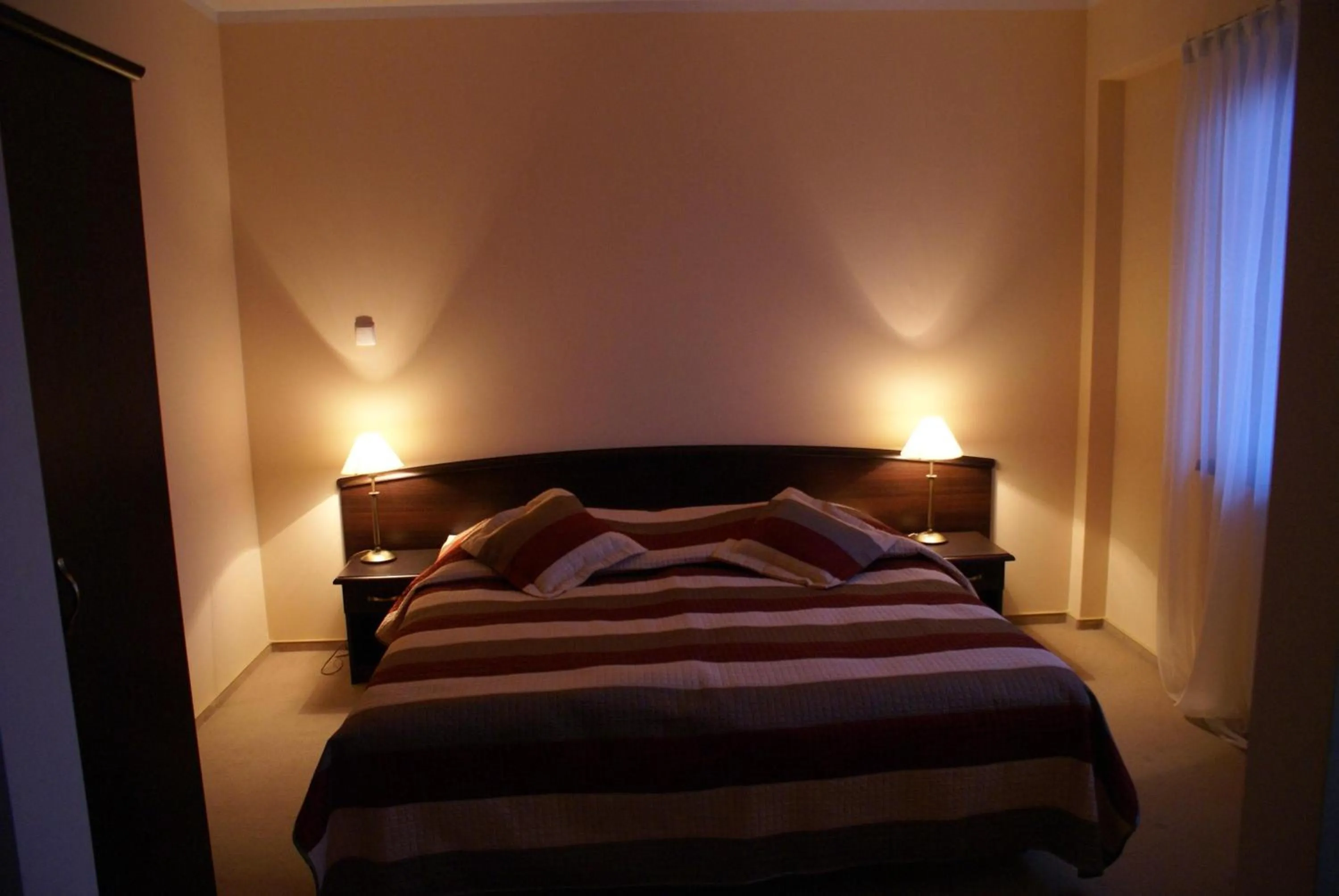 Bed in Hotel Anek