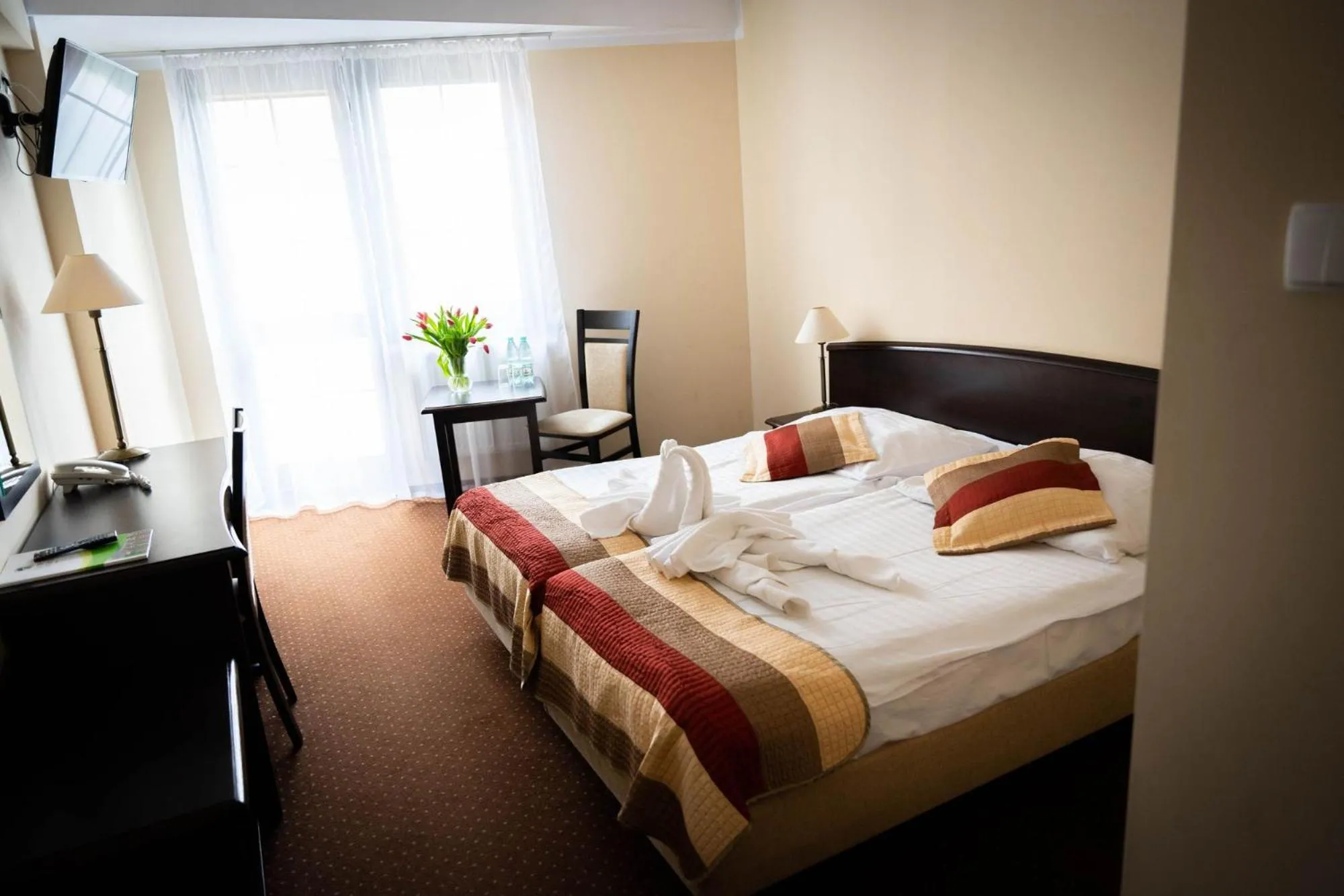 Bed in Hotel Anek