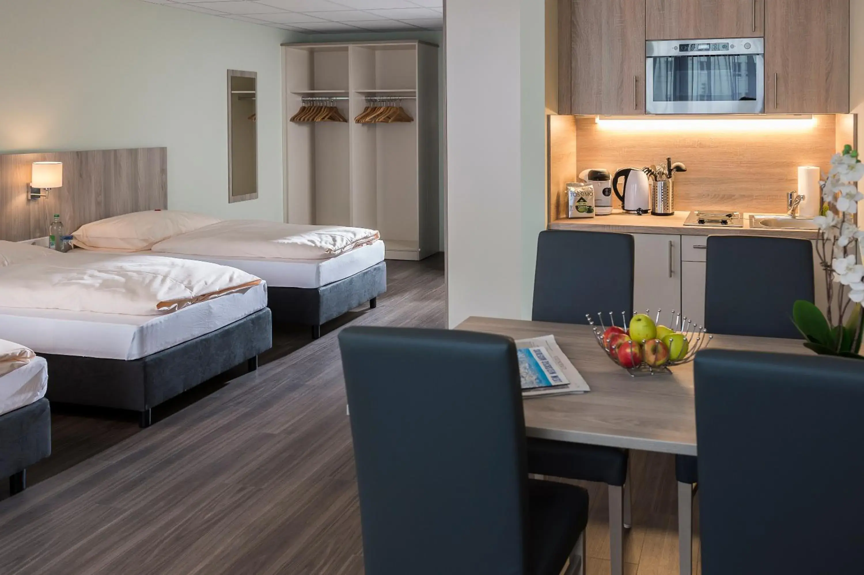 Classic Quadruple Room in SVG Boardinghaus Classic Quadruple Room in SVG Boardinghaus