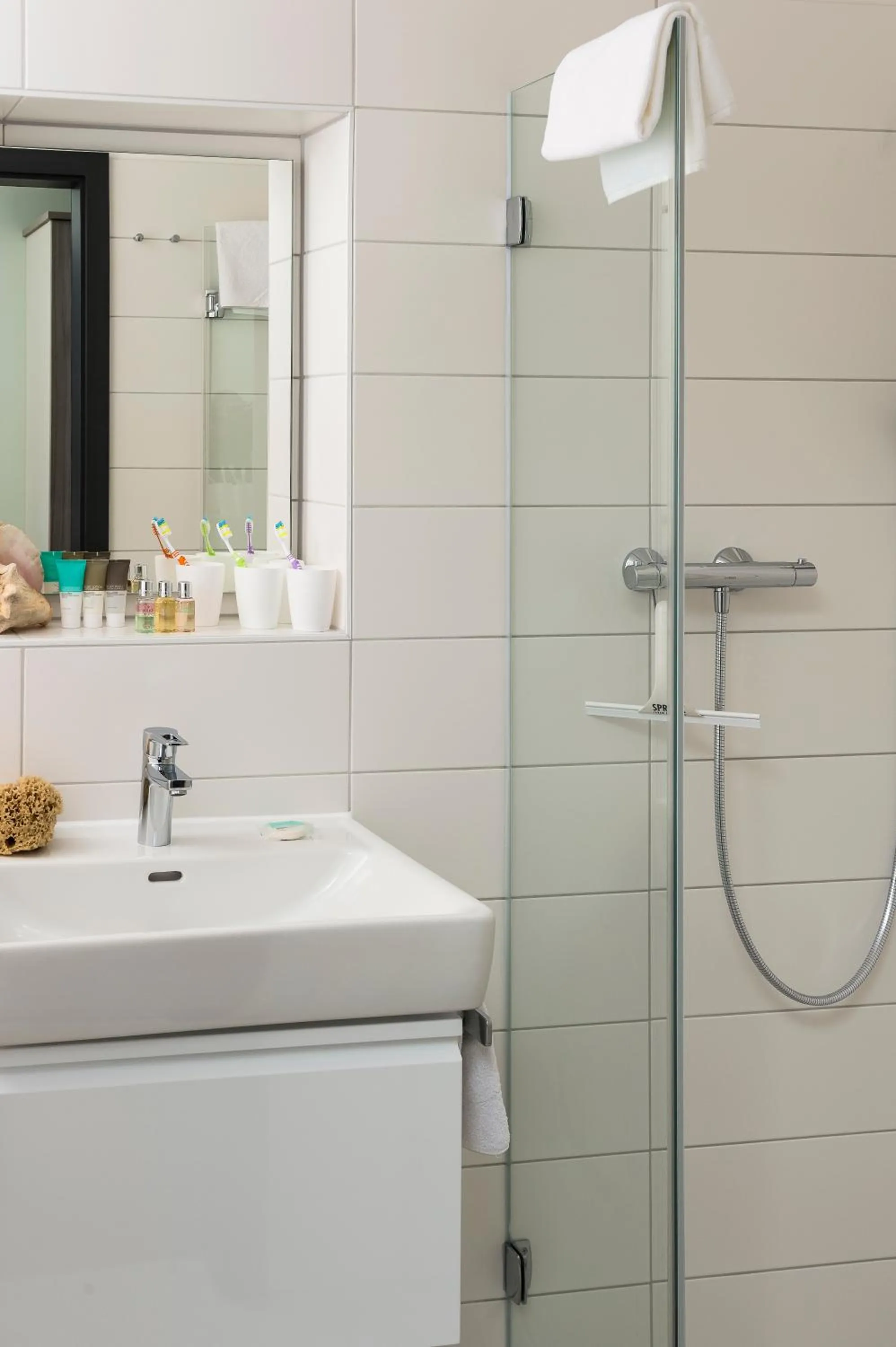 Bathroom in AINO Aparthotel Olympiapark