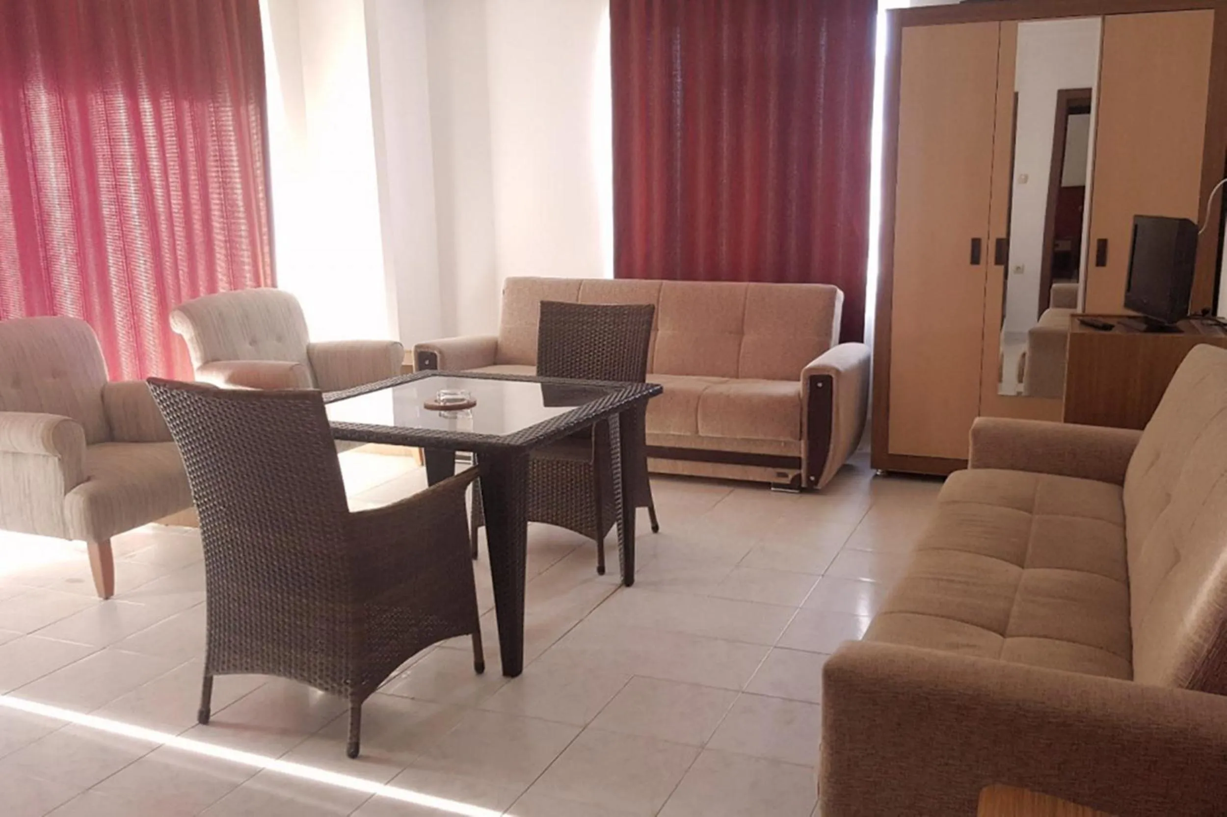 Living room in Carmen Suite Hotel