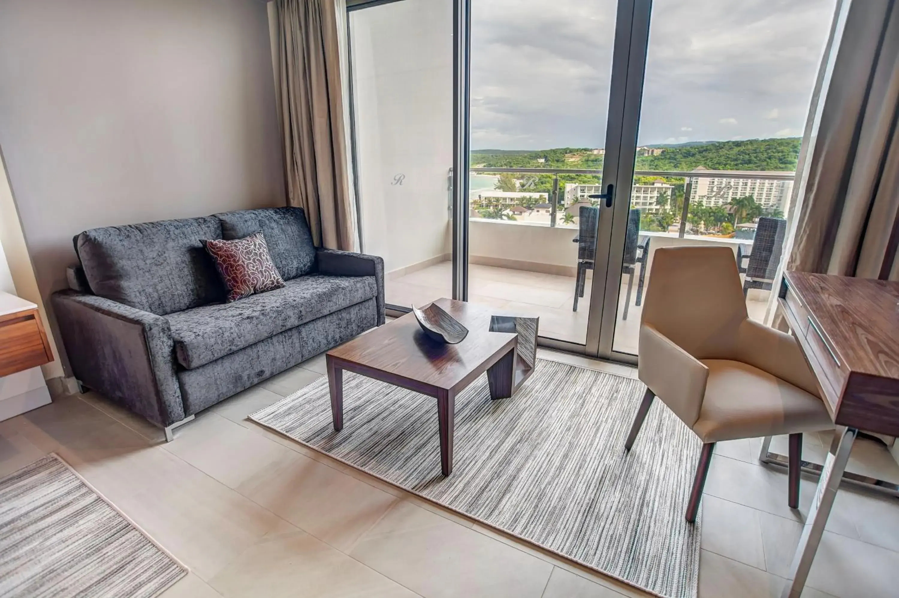 Living room in Royalton Blue Waters Montego Bay, An Autograph Collection All-Inclusive Resort Living room in Royalton Blue Waters Montego Bay, An Autograph Collection All-Inclusive Resort