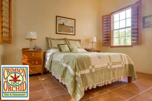 Bedroom, Bed in The Crimson Orchid Inn at Orchid Bay