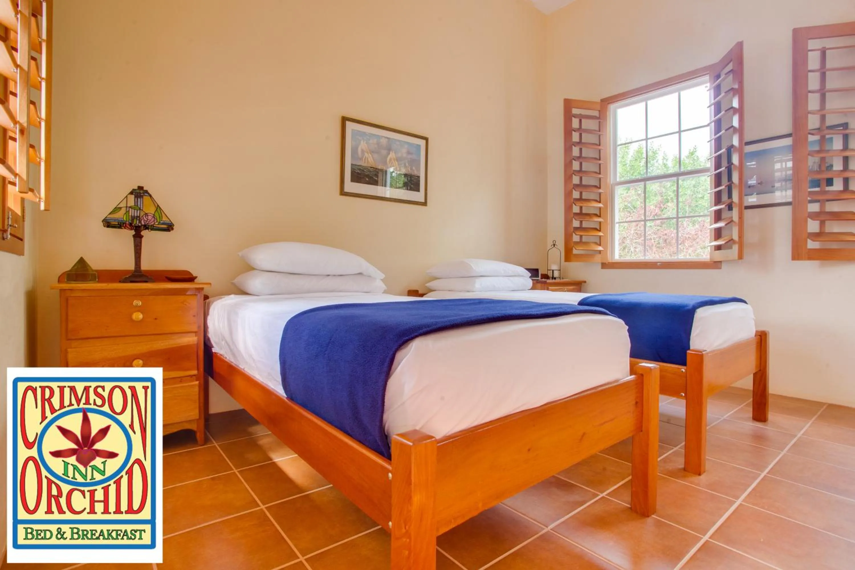 Bedroom, Bed in The Crimson Orchid Inn at Orchid Bay