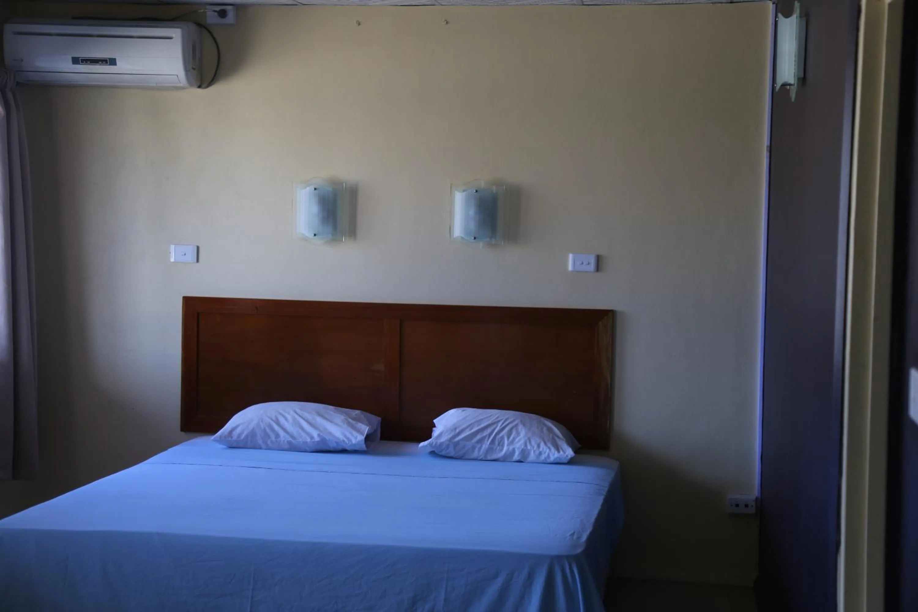 Bedroom, Bed in Funworld Plaza Hotel