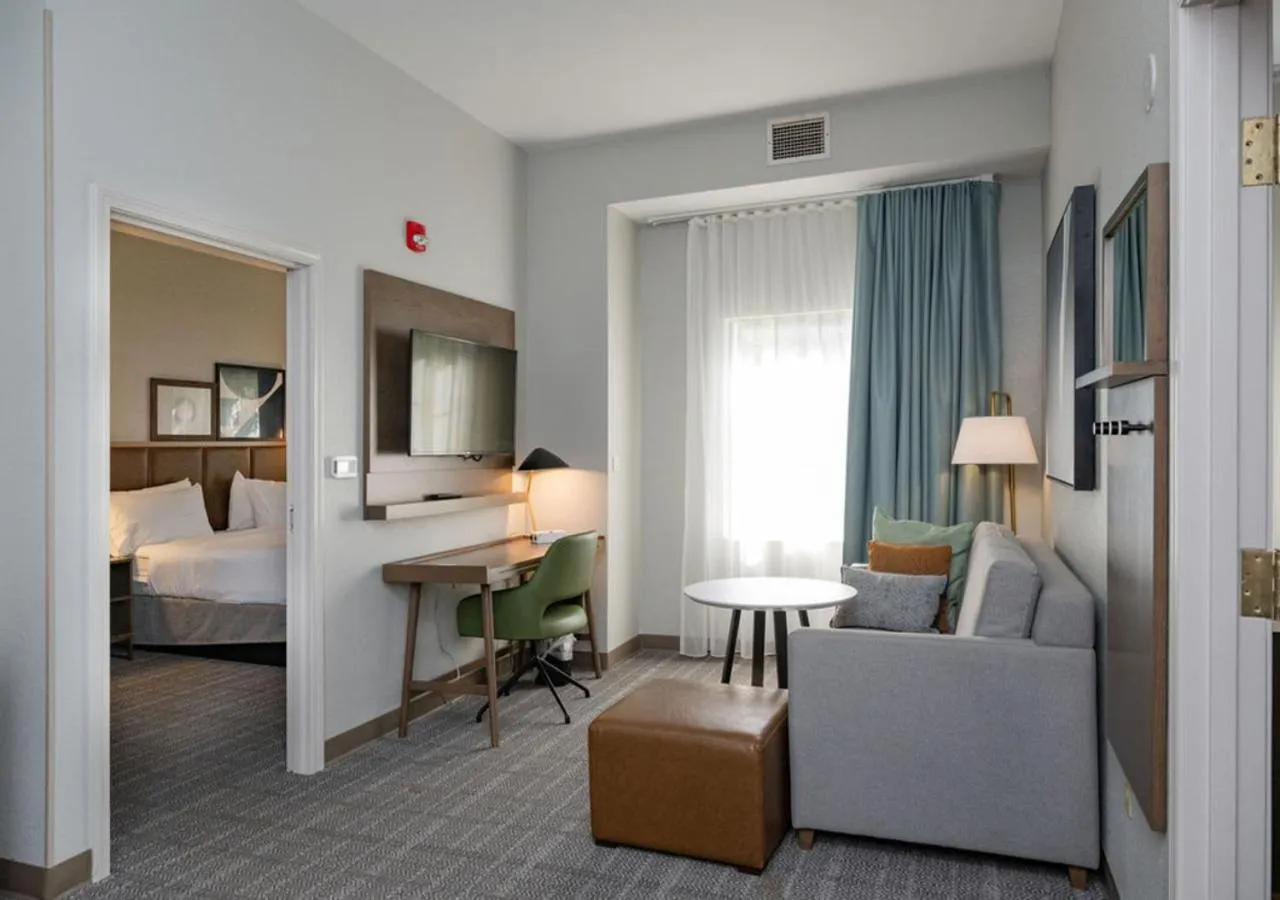 Living room, Bed in Staybridge Suites Jackson by IHG