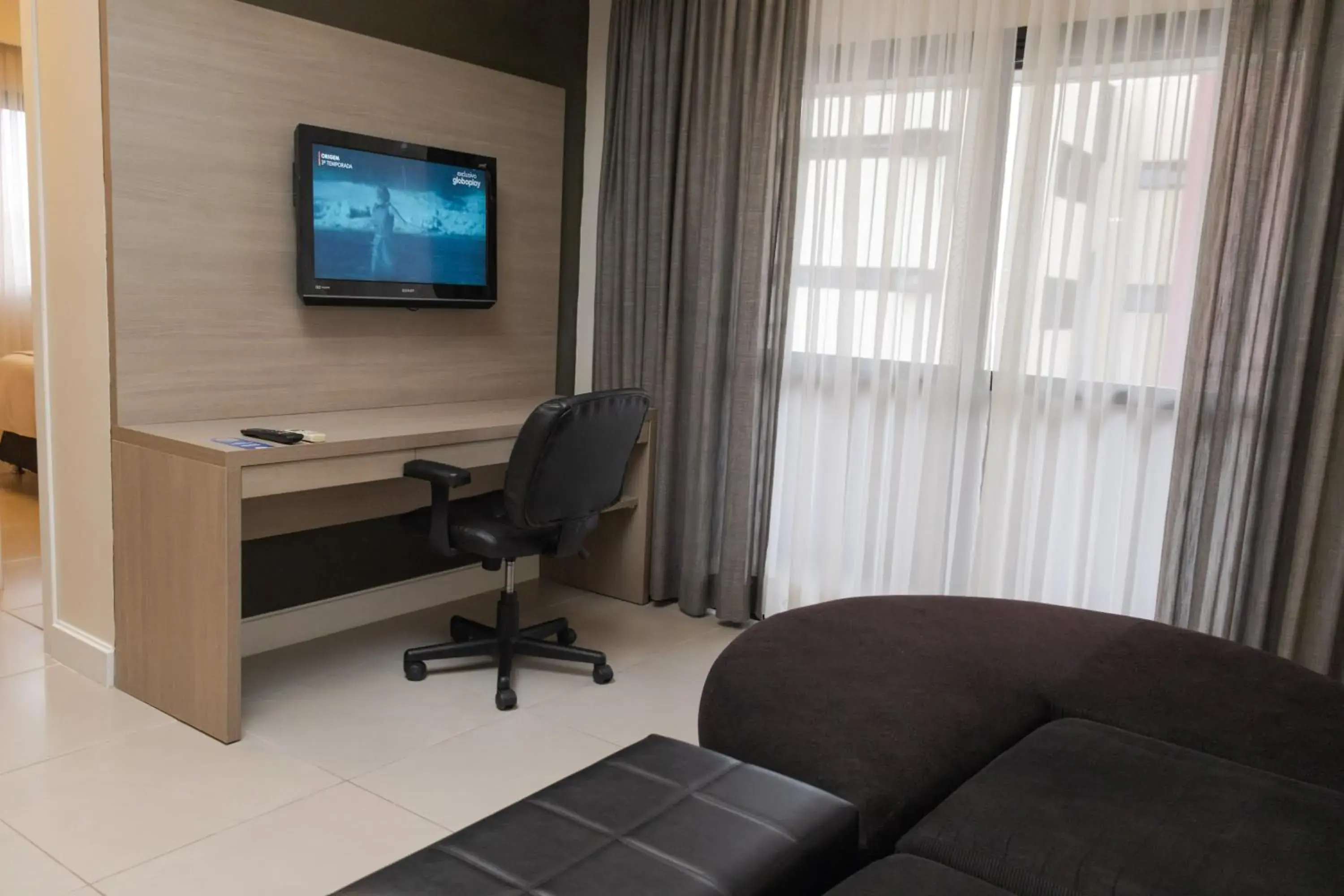 Living room in Hotel Adrianópolis All Suites Living room in Hotel Adrianópolis All Suites