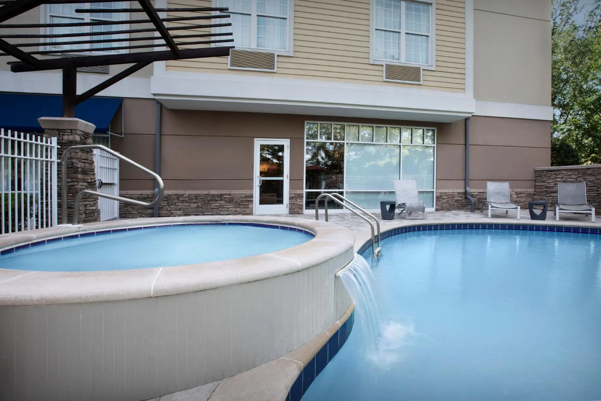 Swimming pool in Hotel Indigo Jacksonville-Deerwood Park by IHG