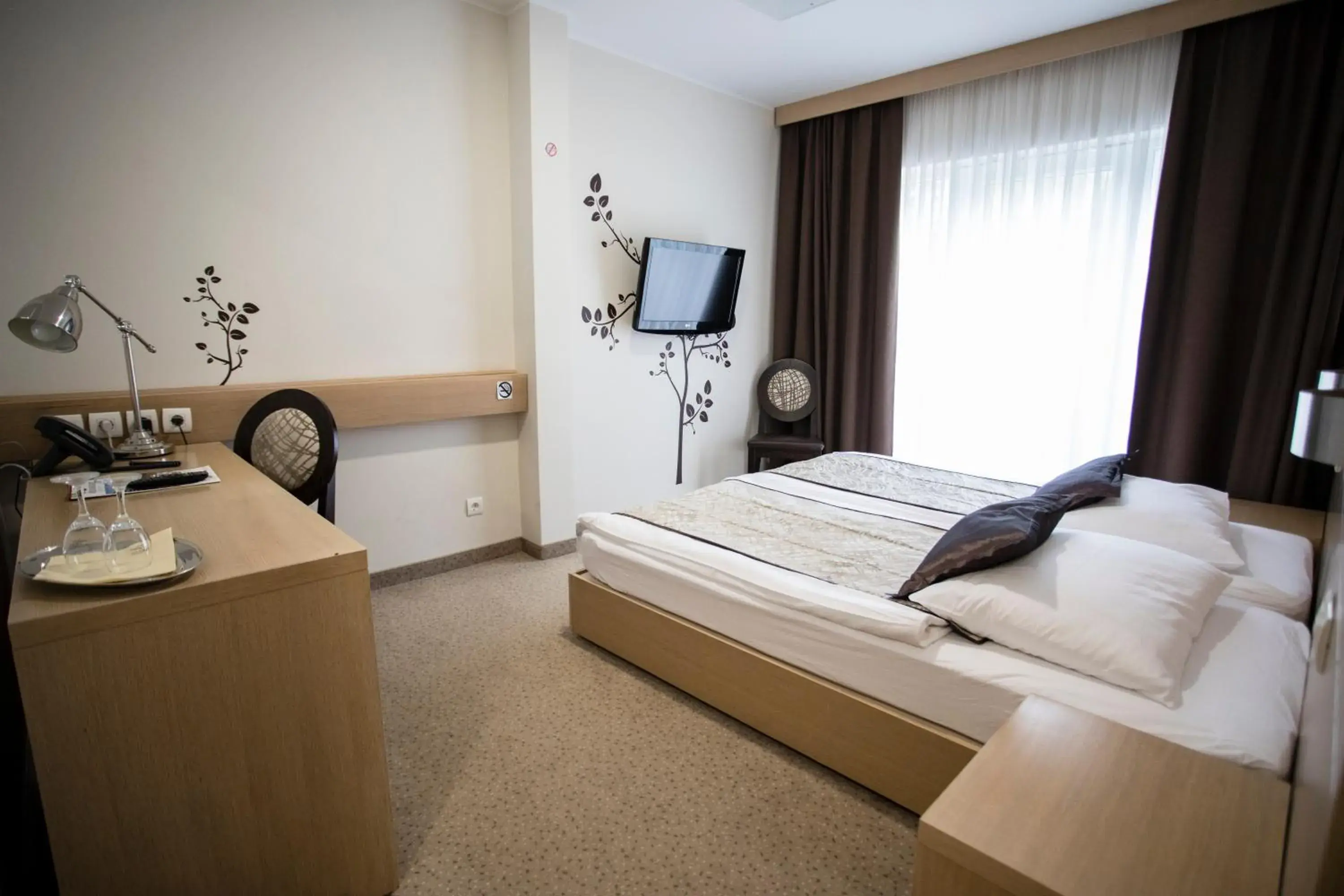 Bed in Hotel Mangart Bed in Hotel Mangart