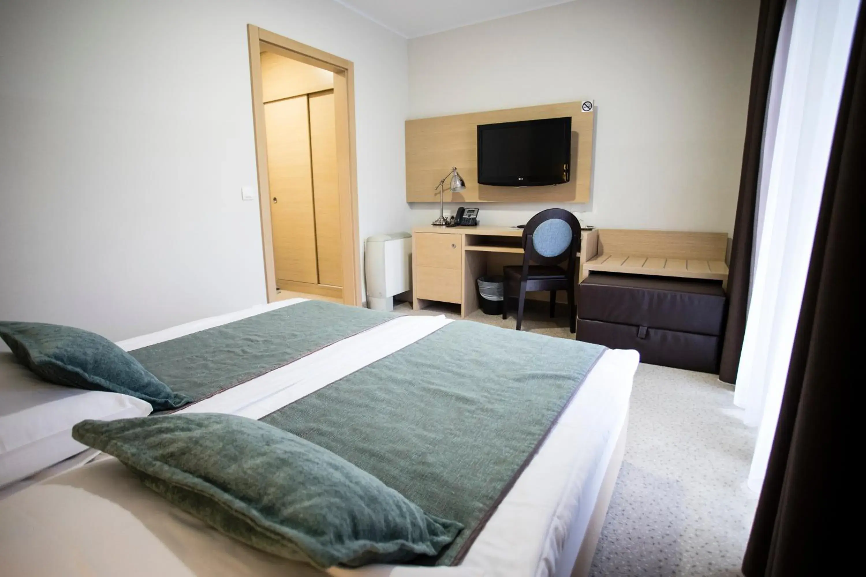 Photo of the whole room, Bed in Hotel Mangart Photo of the whole room, Bed in Hotel Mangart