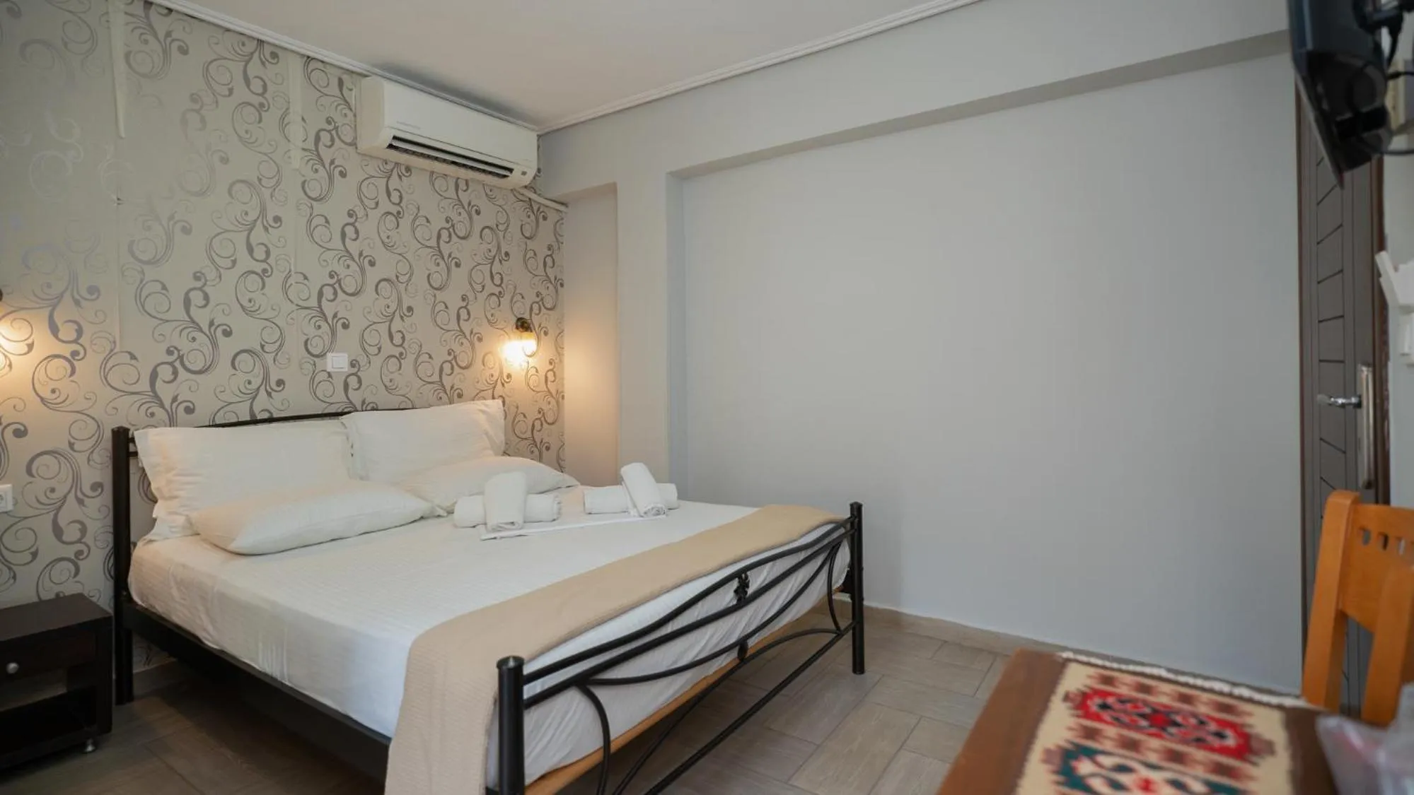 Bed in Toti Boutique Rooms