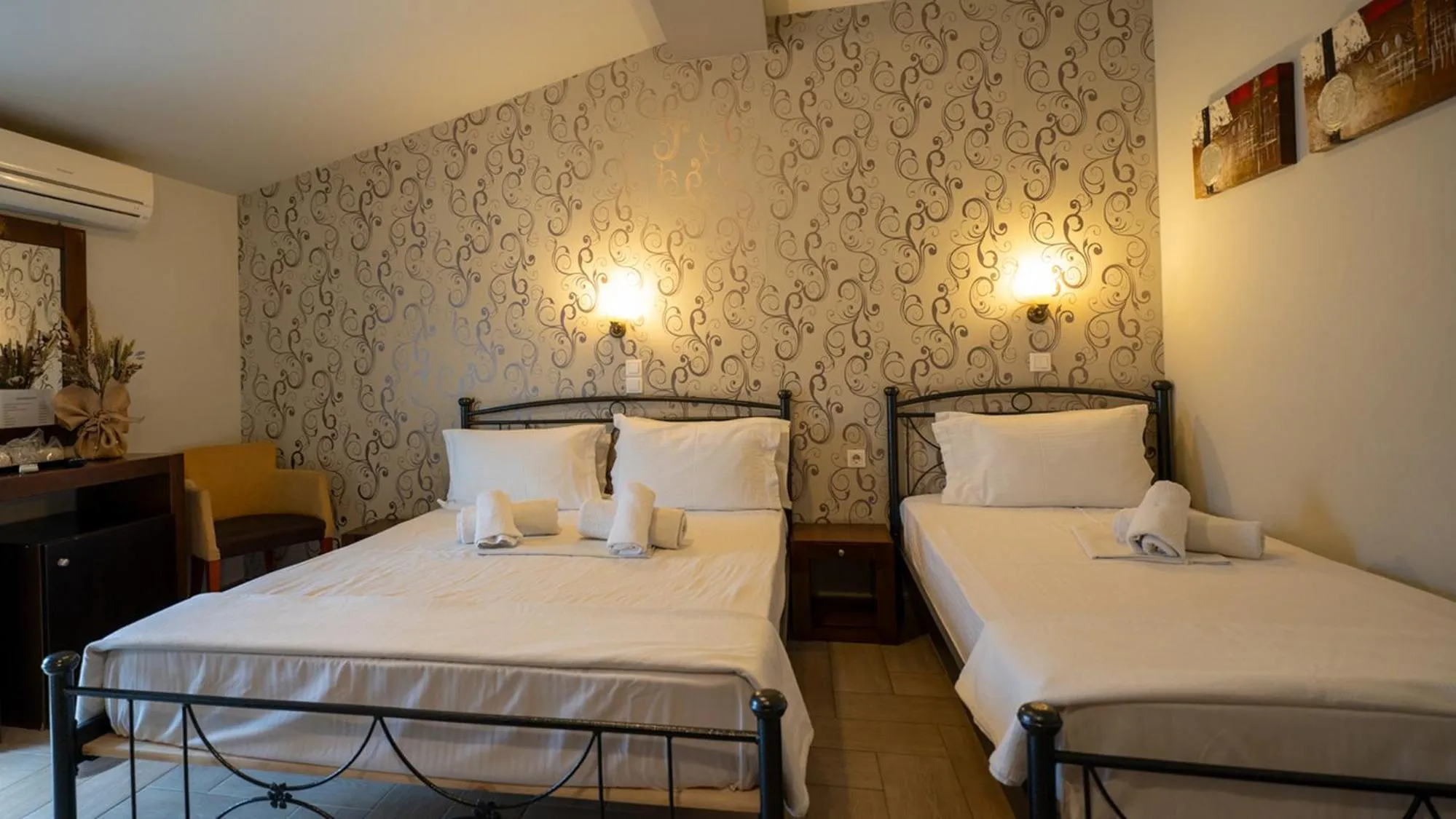 Bed in Toti Boutique Rooms