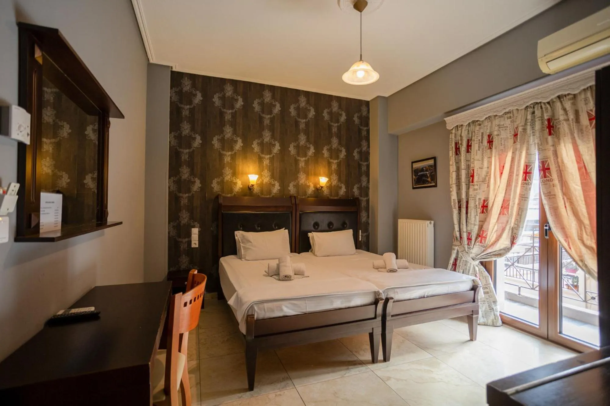 Bed in Toti Boutique Rooms