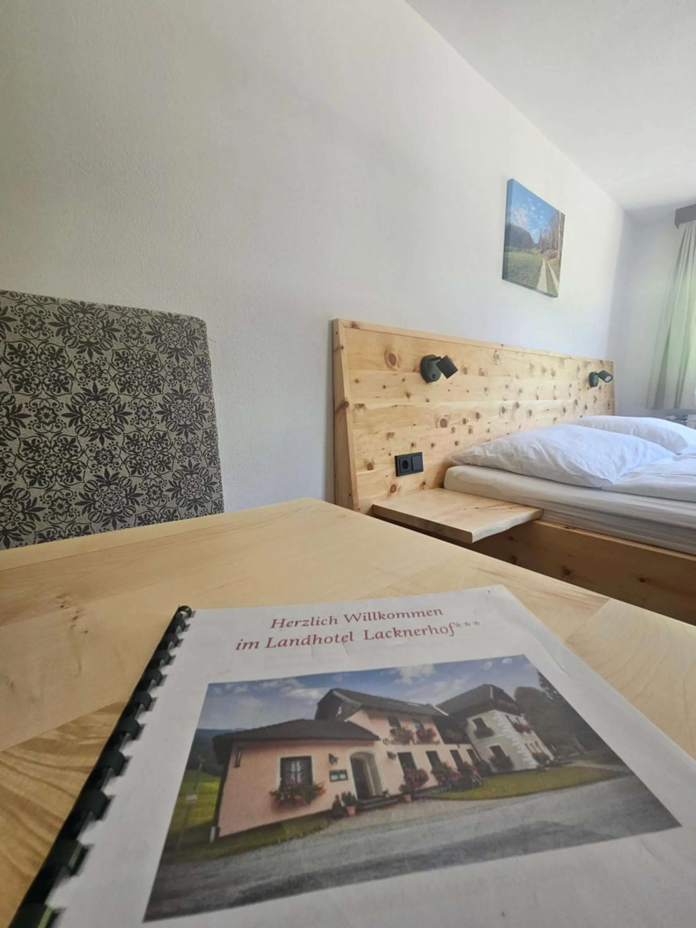 Seating area, Bed in Landhotel Lacknerhof