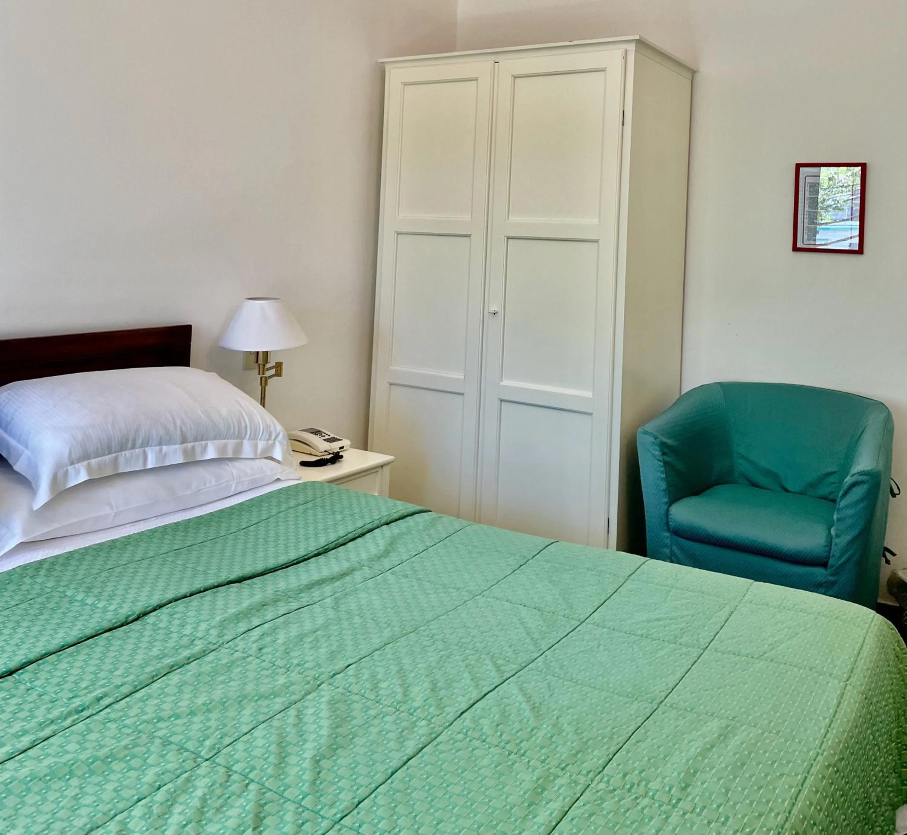 Bed in Hotel Beau Rivage