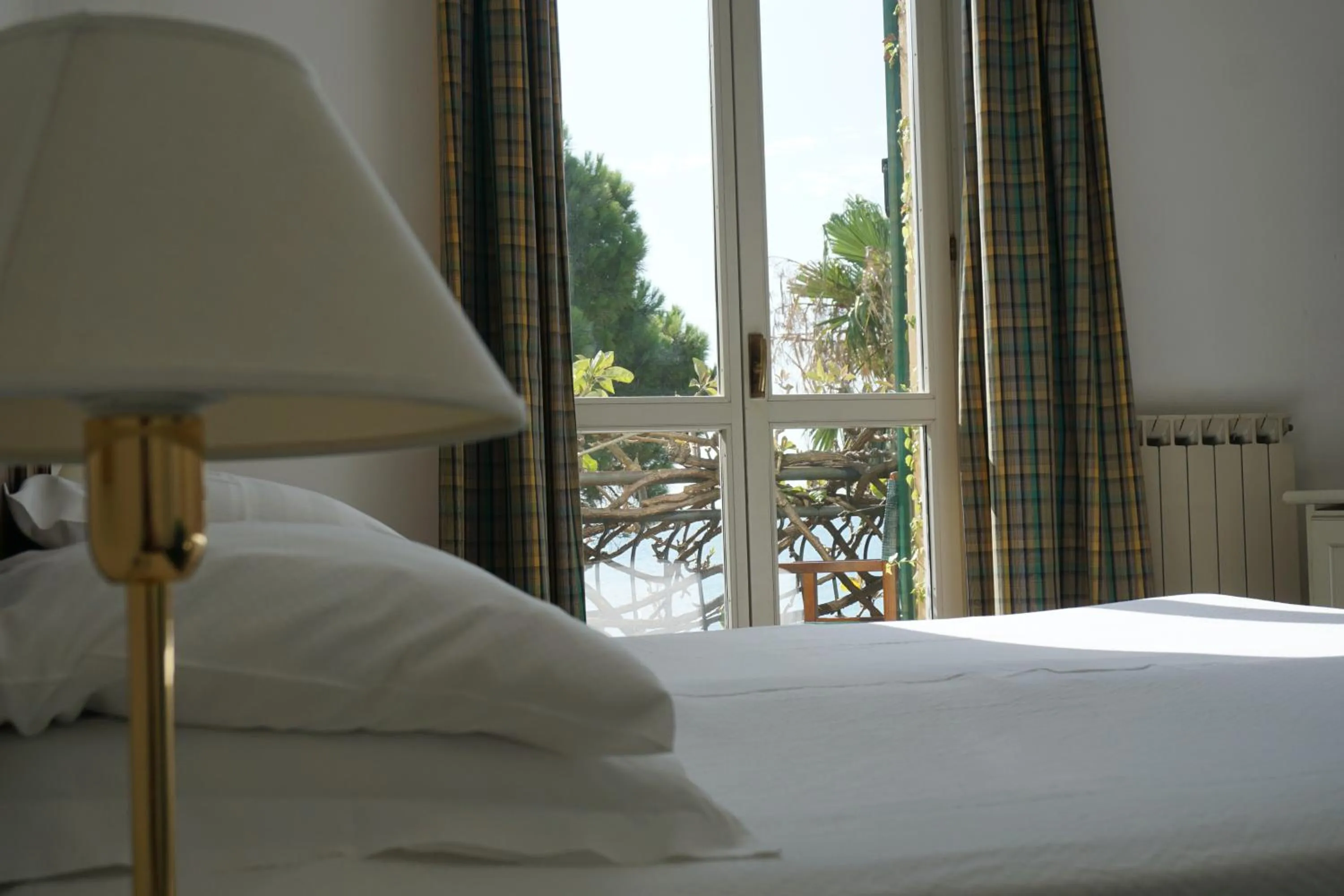 Bed in Hotel Beau Rivage