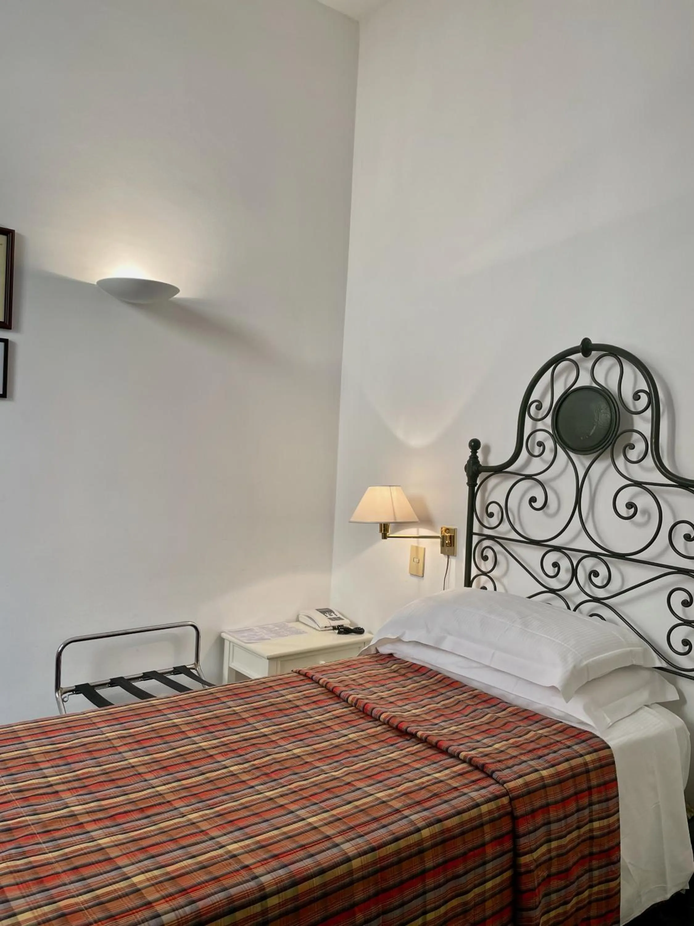 Bed in Hotel Beau Rivage