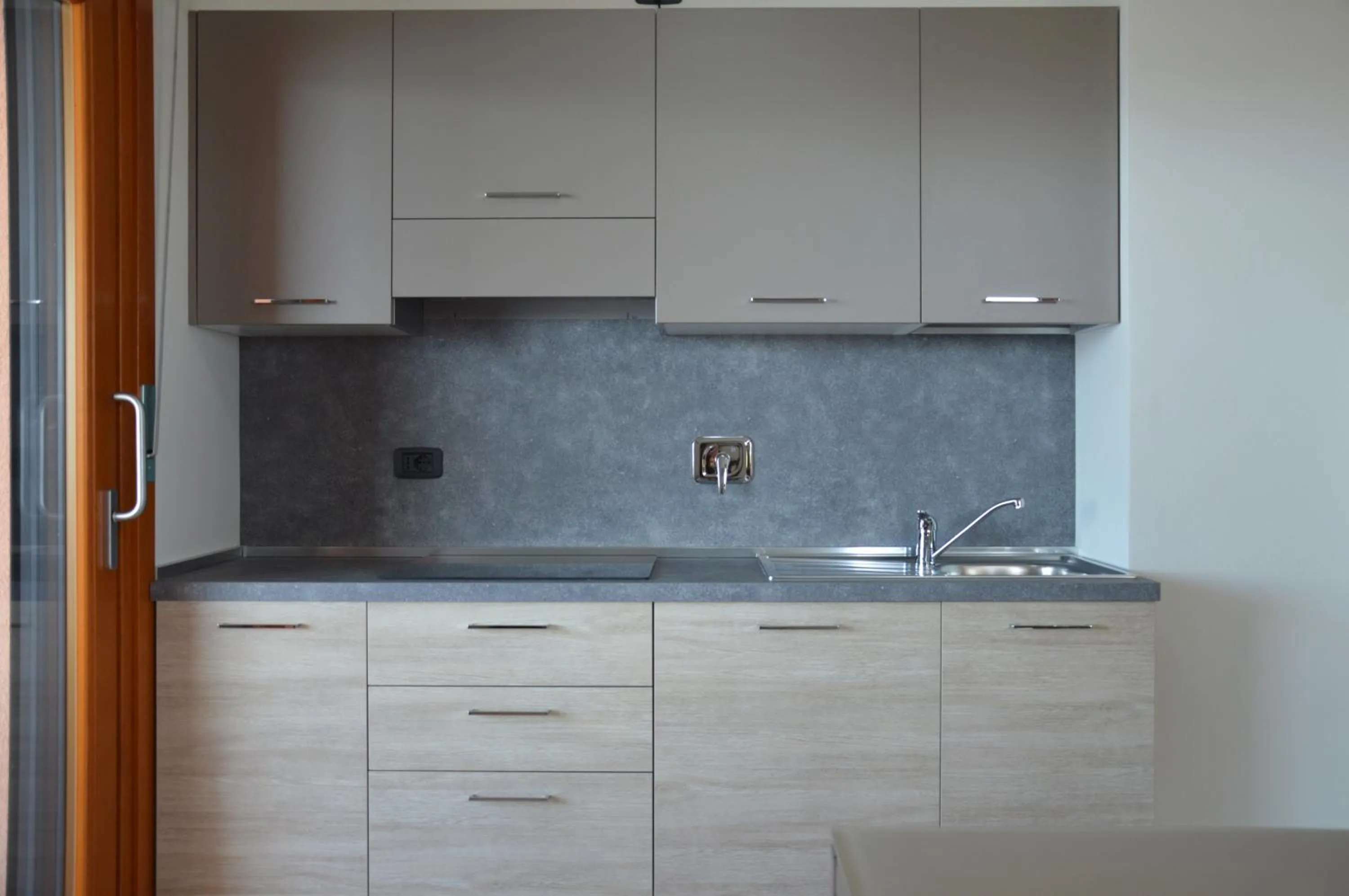 Kitchen or kitchenette in Aparthotel Capitol