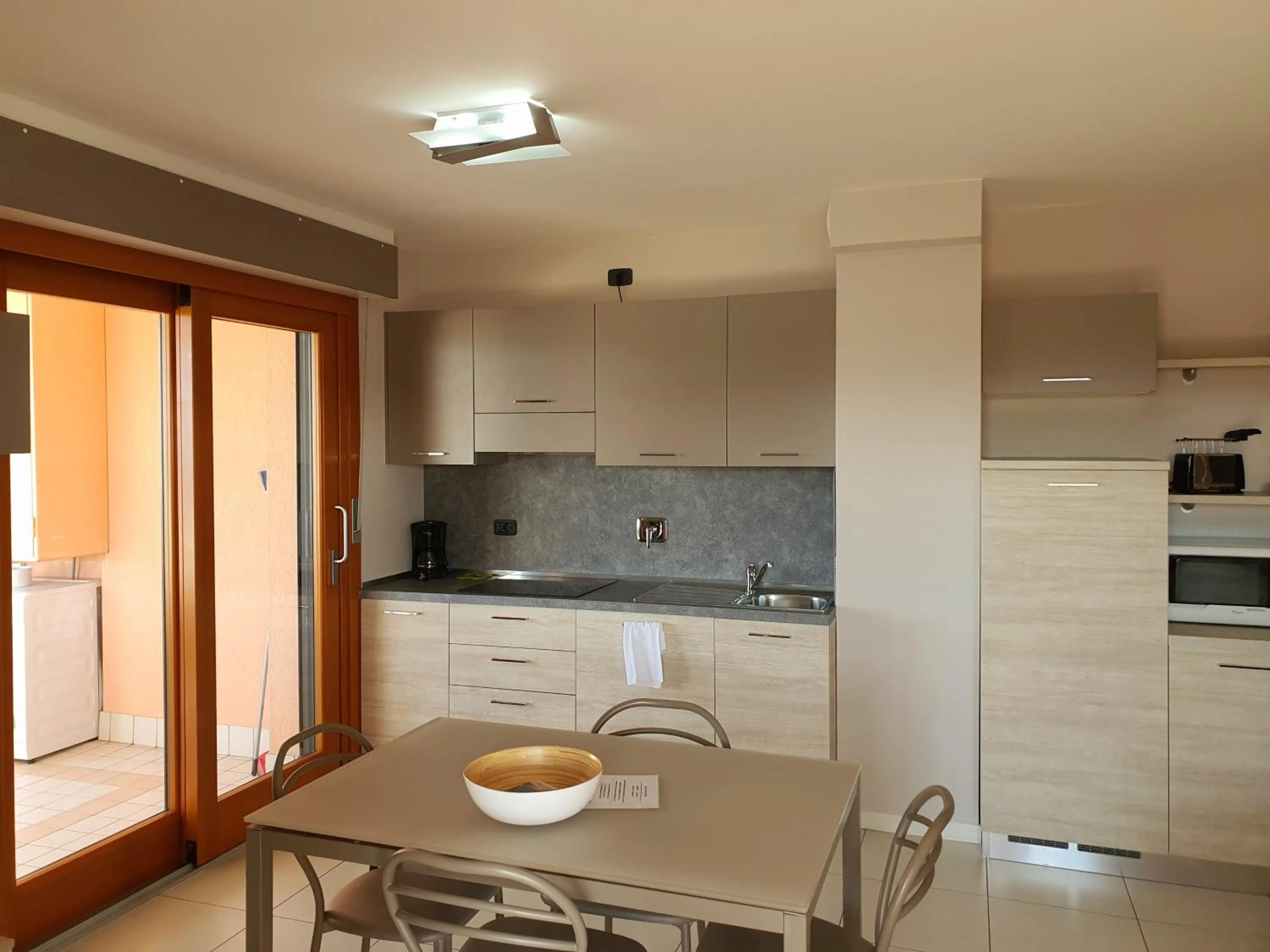 Kitchen or kitchenette in Aparthotel Capitol