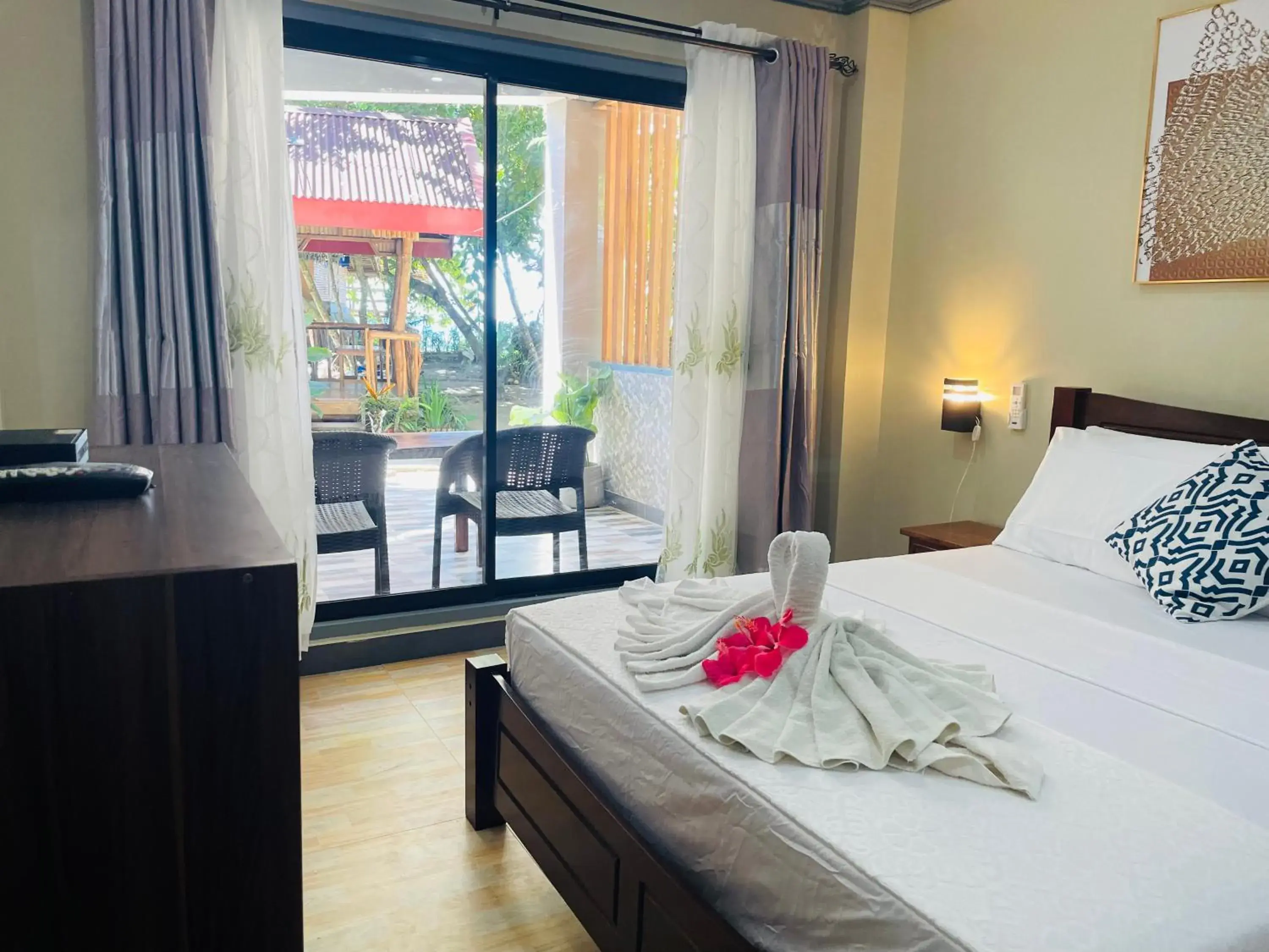 Bed in White Beach Front and Cottages Bed in White Beach Front and Cottages