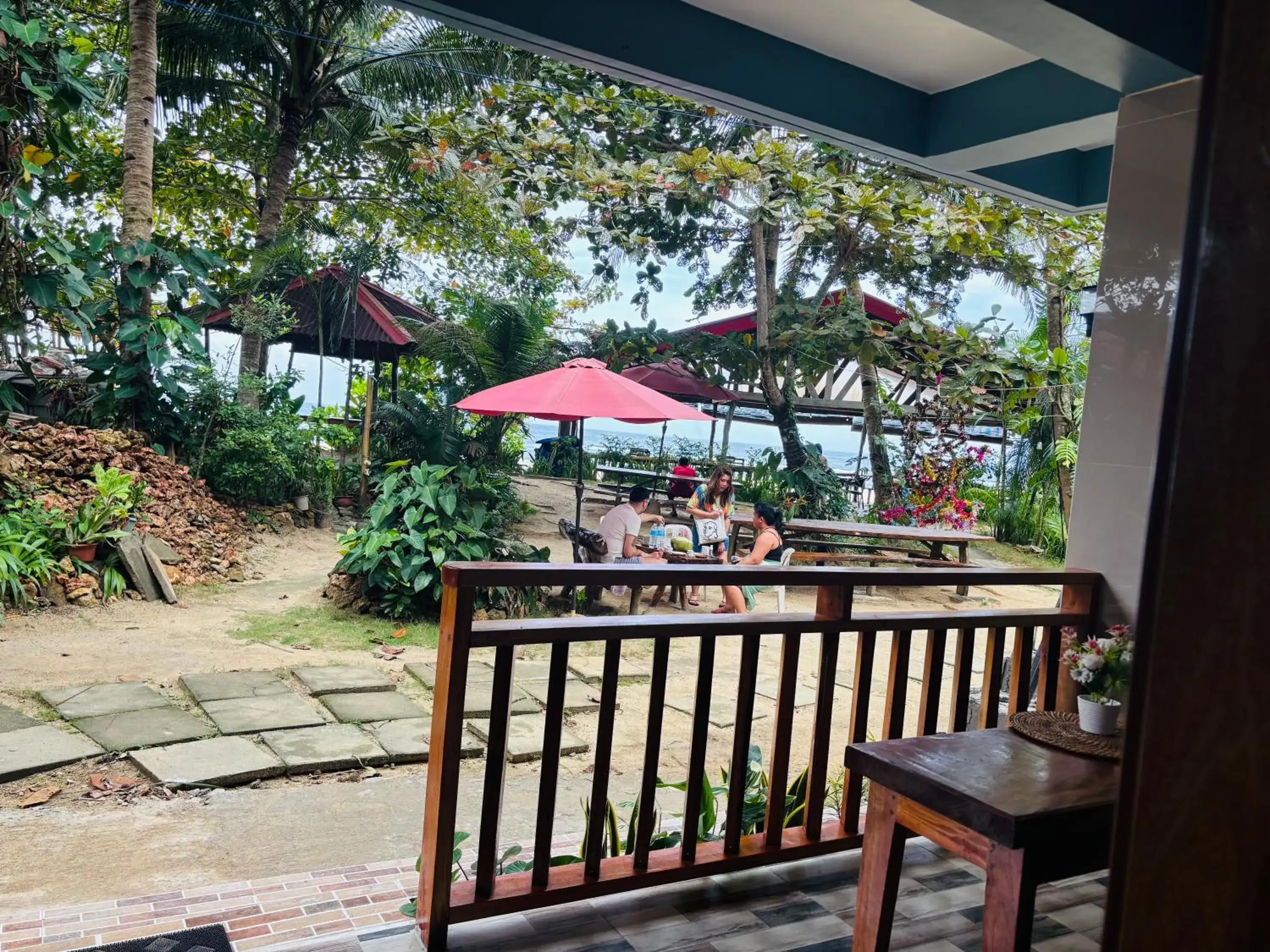 Garden view in White Beach Front and Cottages Garden view in White Beach Front and Cottages