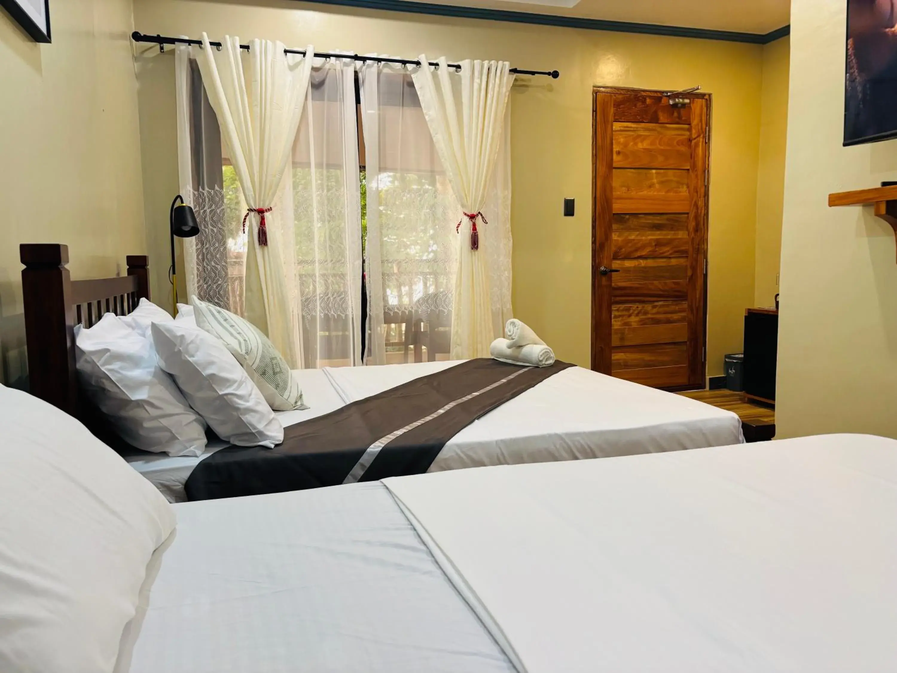 Property building, Bed in White Beach Front and Cottages Property building, Bed in White Beach Front and Cottages