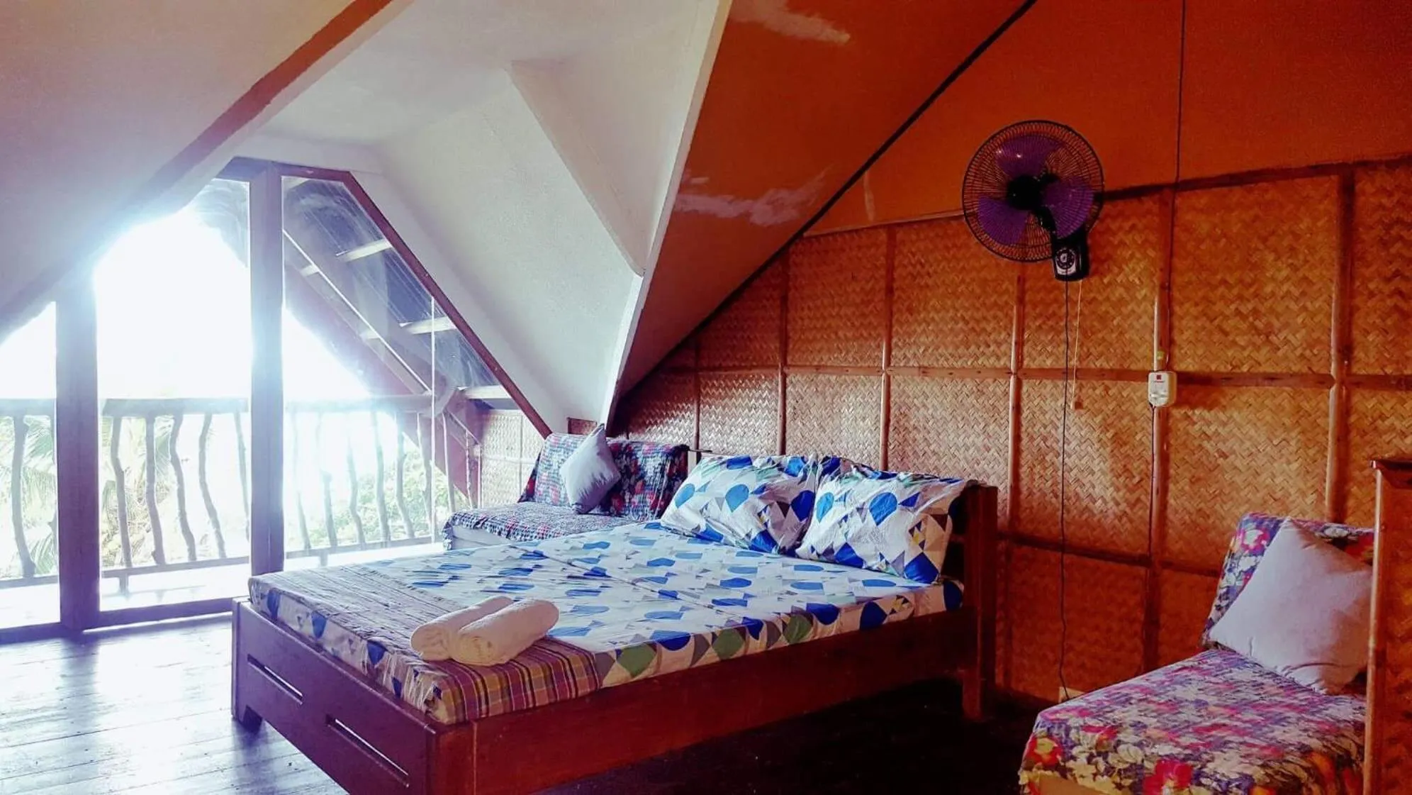 Photo of the whole room, Bed in White Beach Front and Cottages