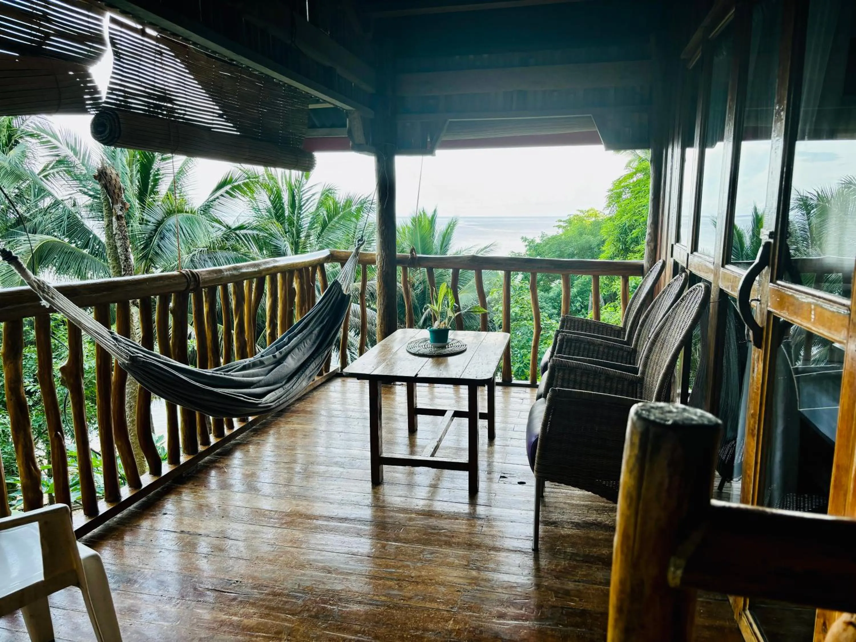 Balcony/Terrace in White Beach Front and Cottages