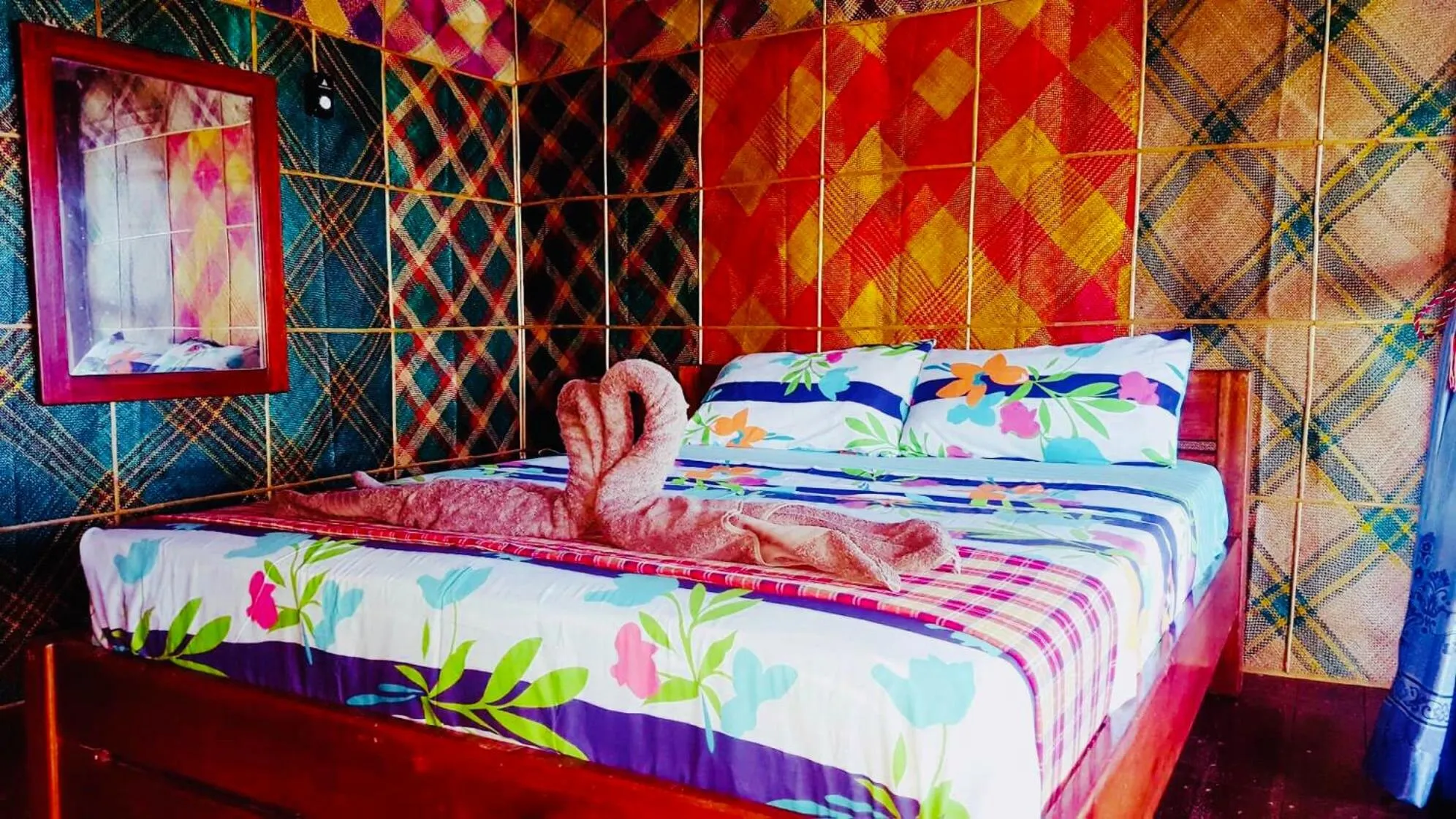 Photo of the whole room, Bed in White Beach Front and Cottages