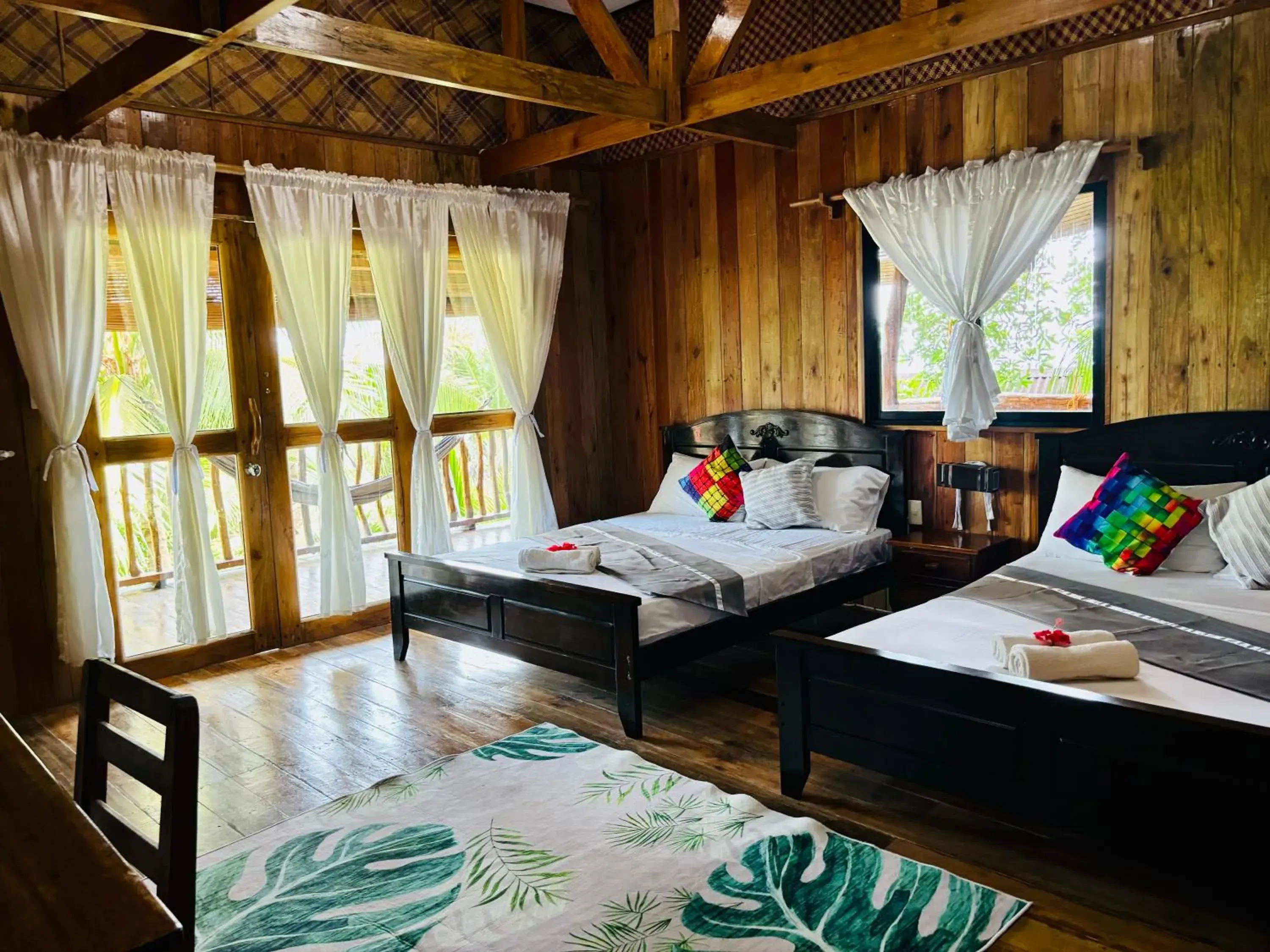 Property building, Bed in White Beach Front and Cottages Property building, Bed in White Beach Front and Cottages