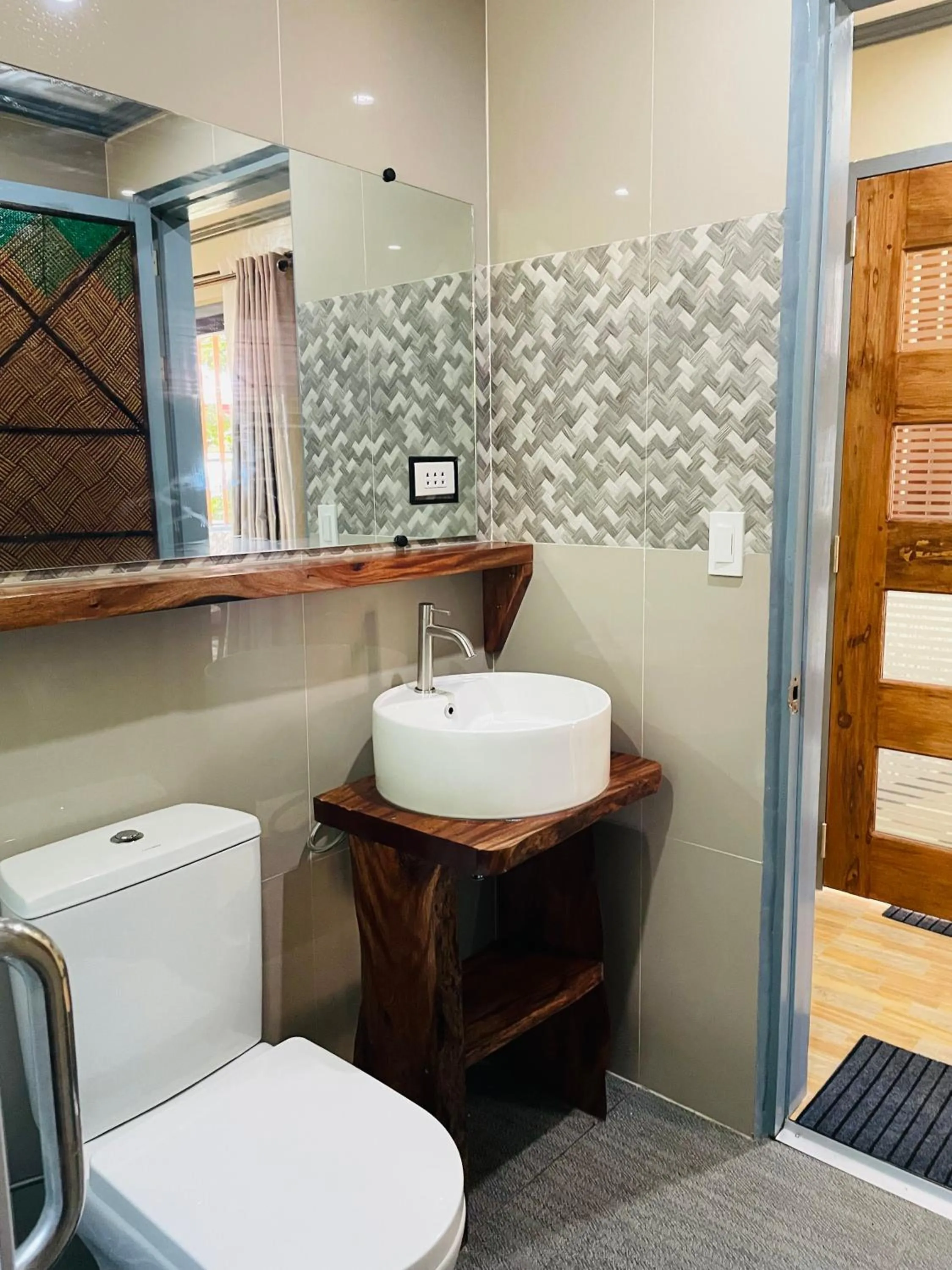 Toilet in White Beach Front and Cottages