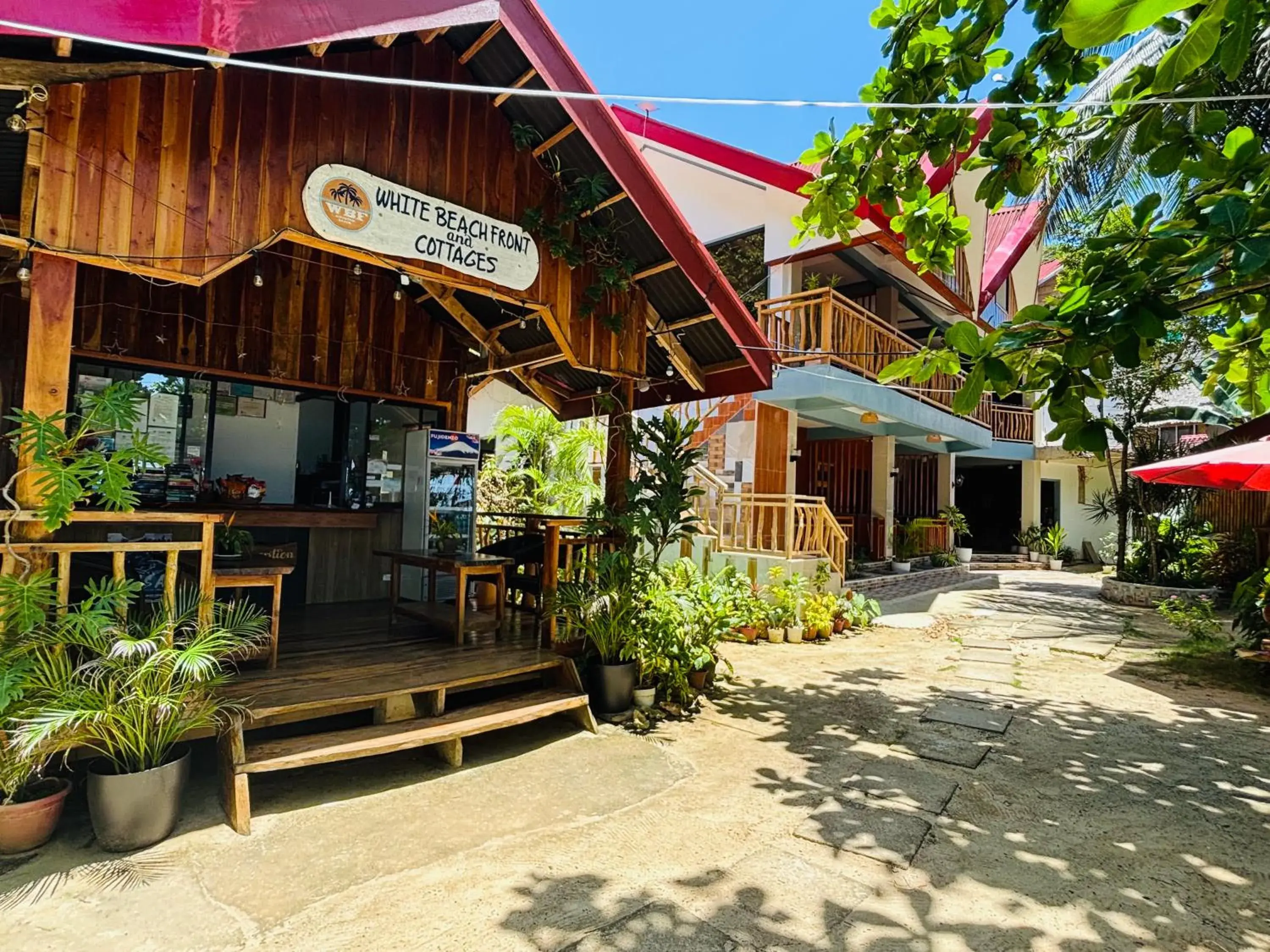 Property building in White Beach Front and Cottages Property building in White Beach Front and Cottages