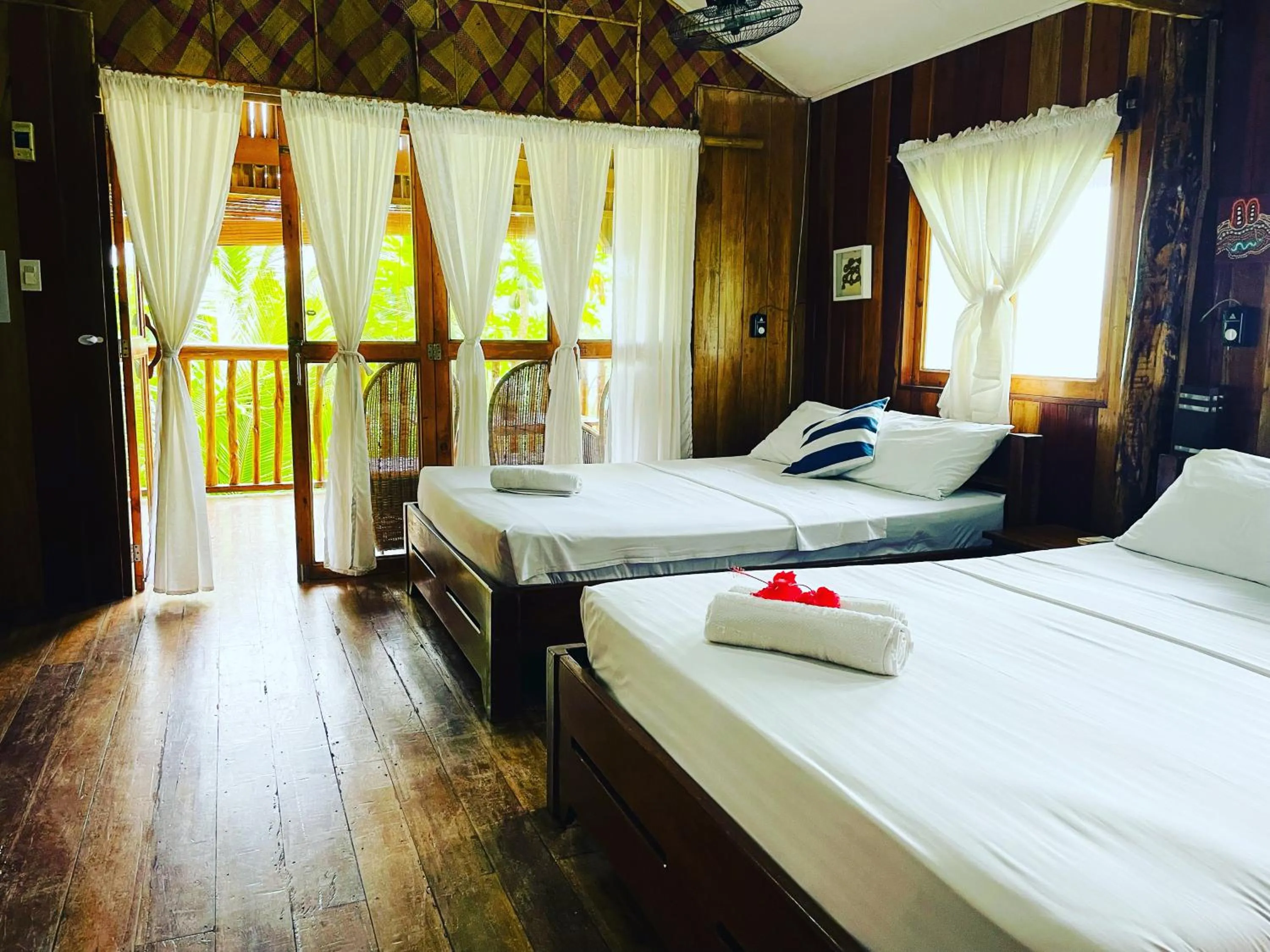 Bed in White Beach Front and Cottages