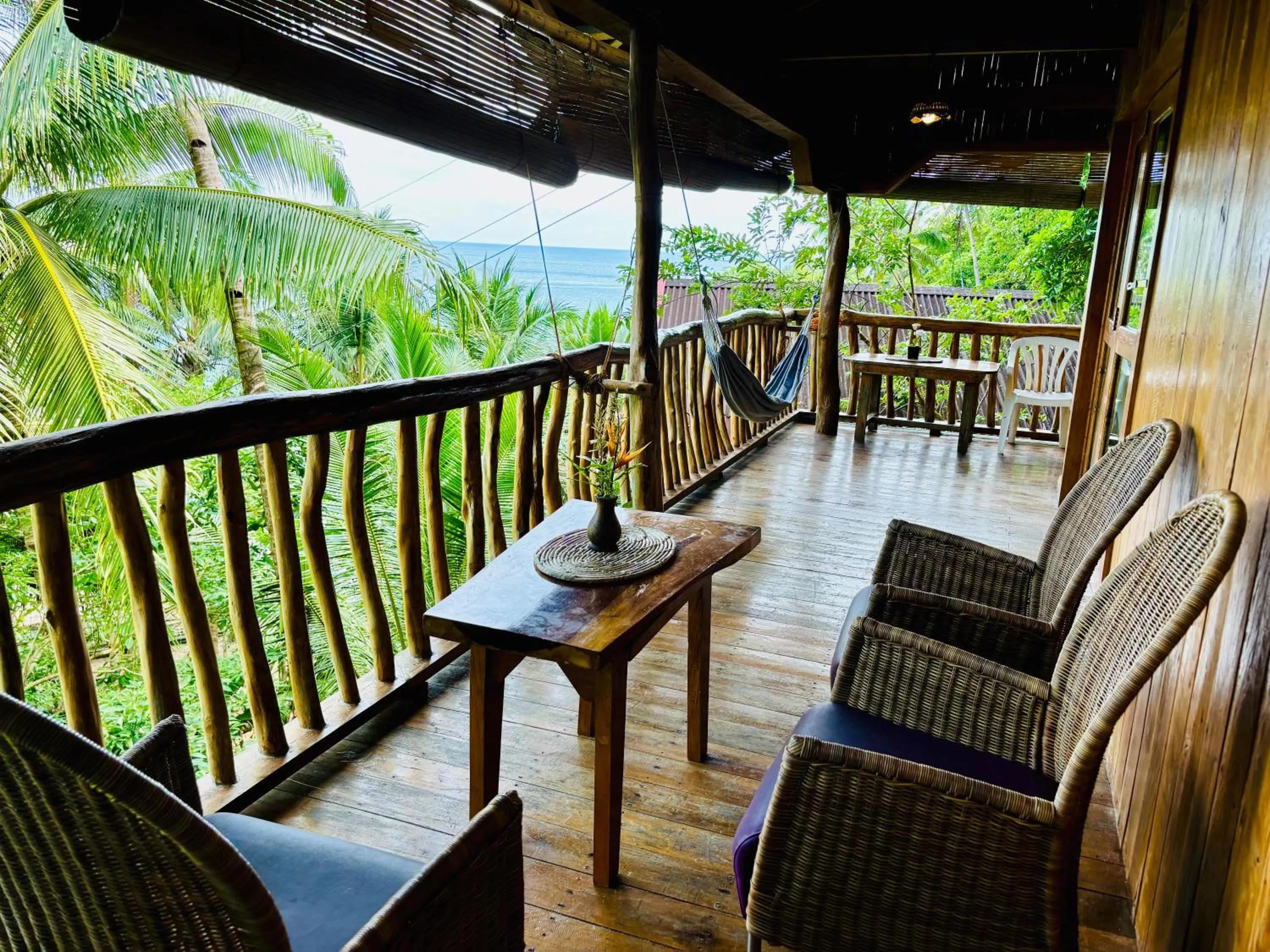 Balcony/Terrace in White Beach Front and Cottages
