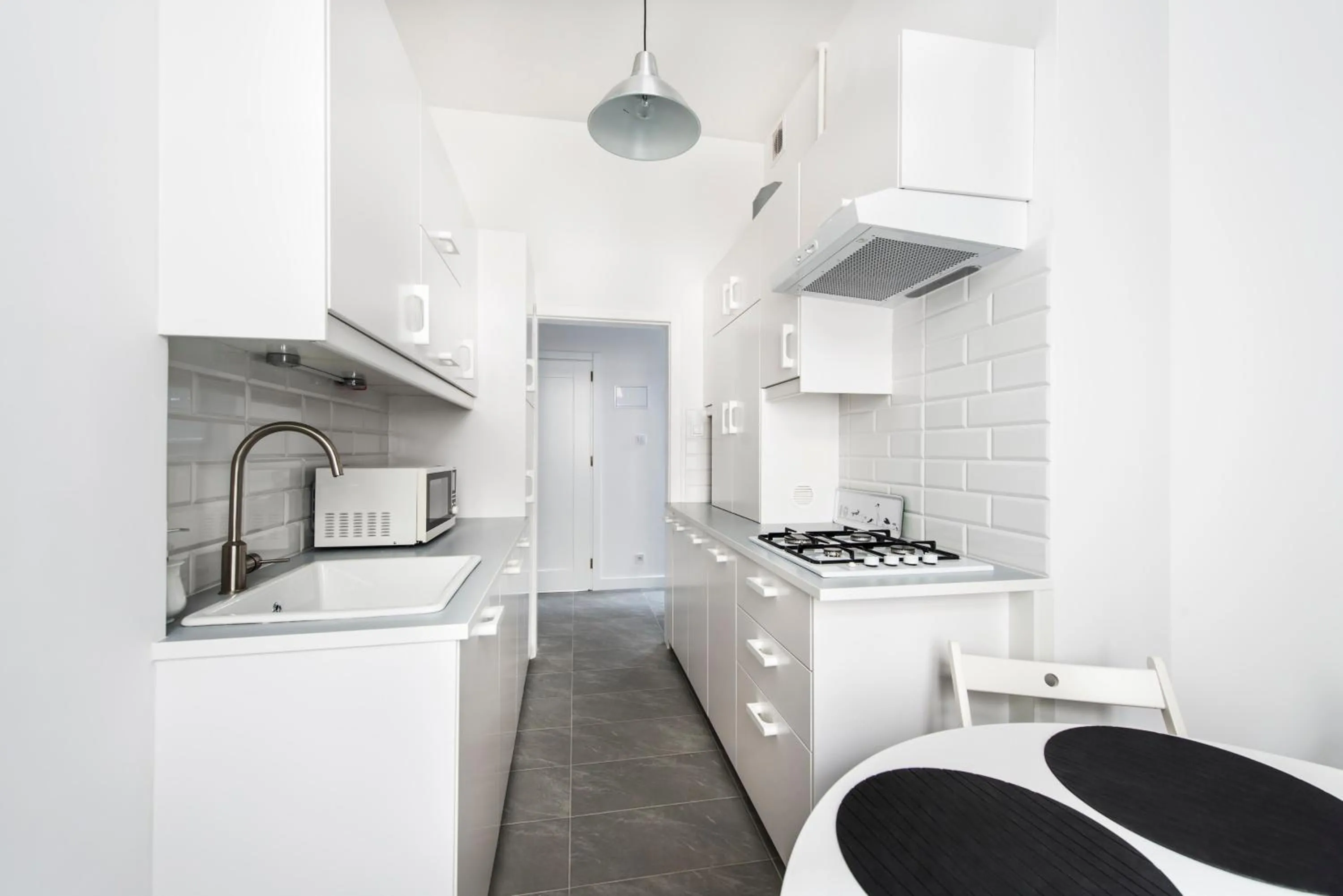 Kitchen or kitchenette in Mieszkanie przy deptaku Sopot by OneApartments