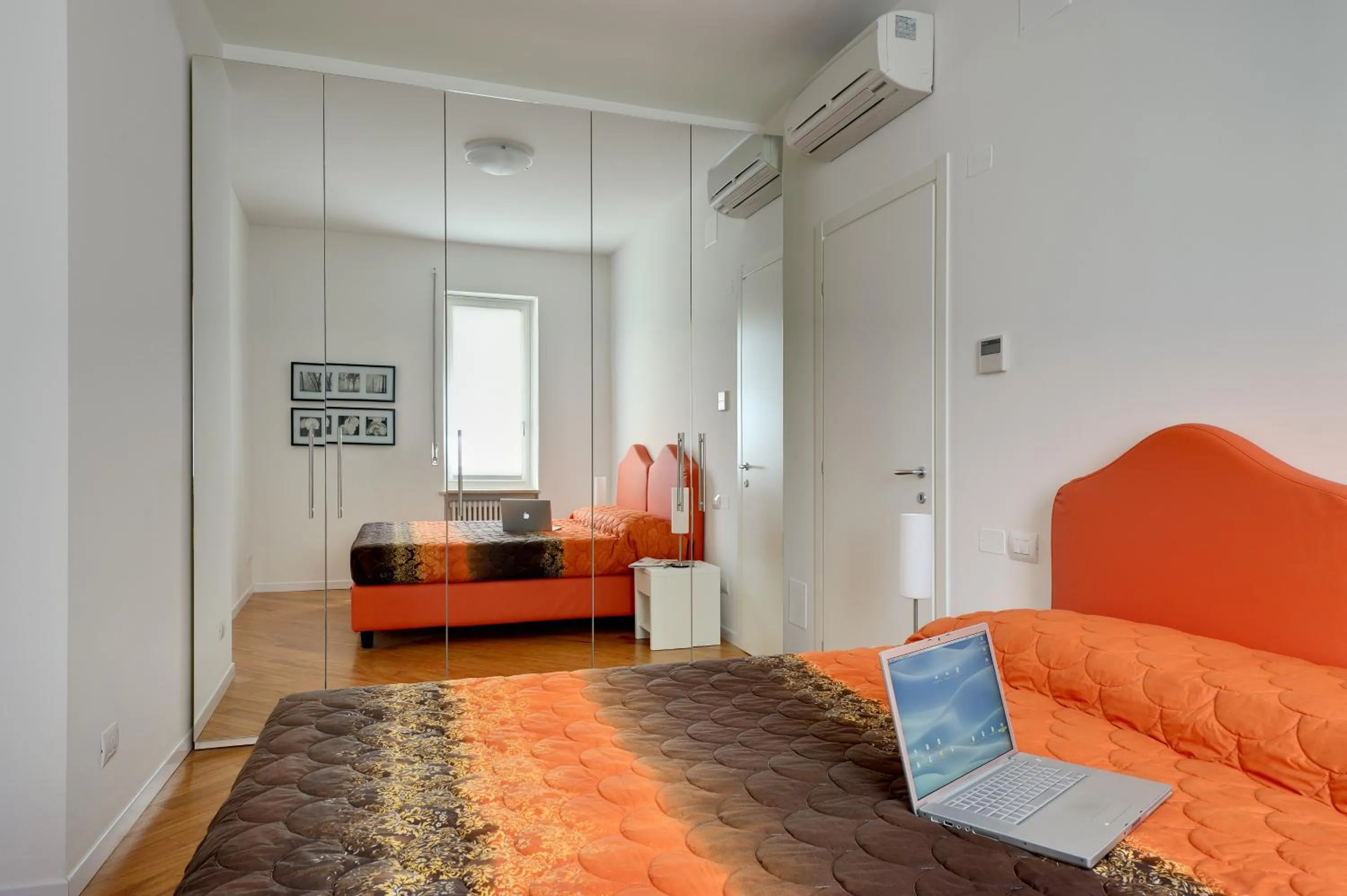 Photo of the whole room, Bed in My House Apartments