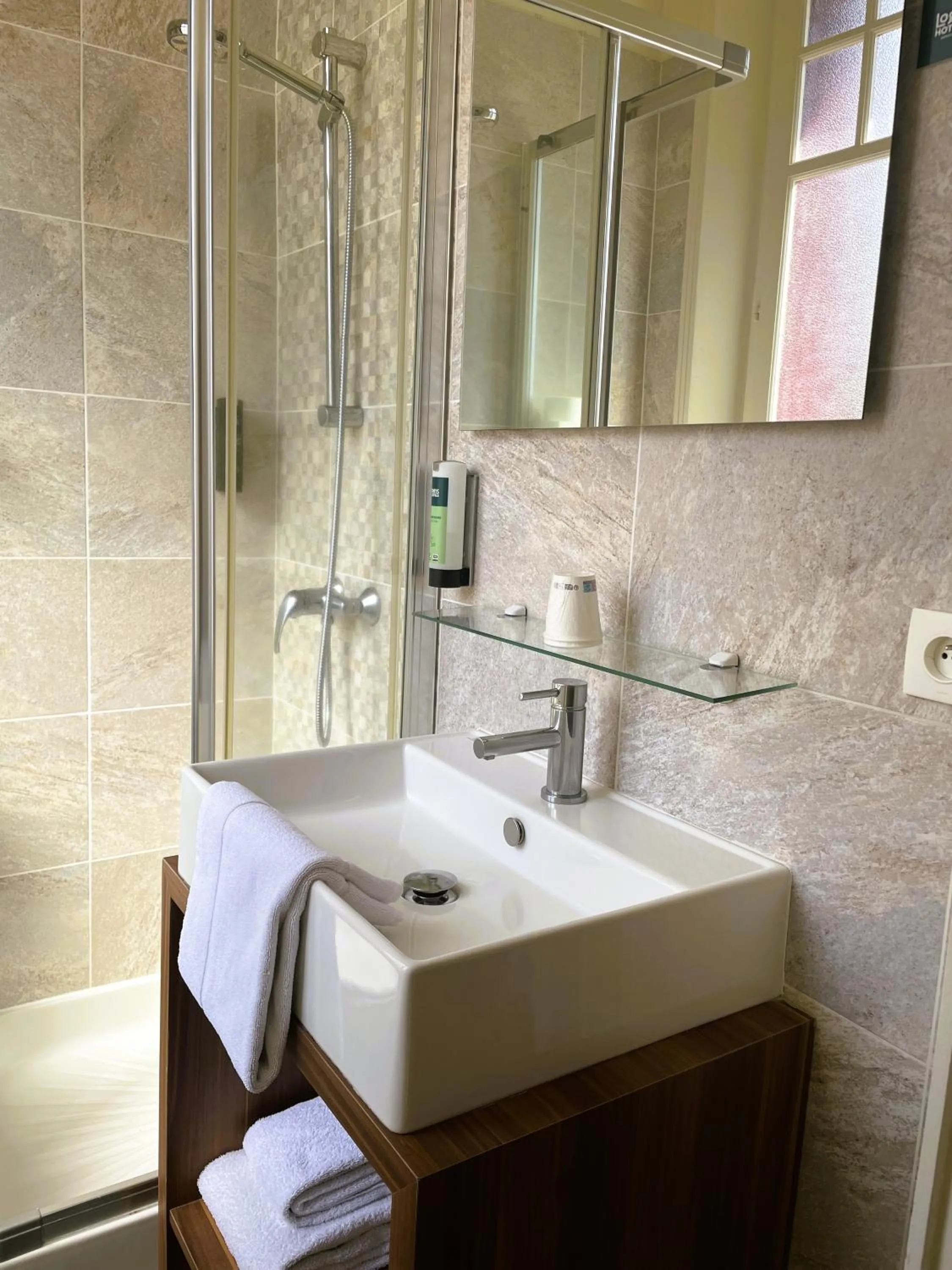 Bathroom in Logis Hôtel Le Saint Florent