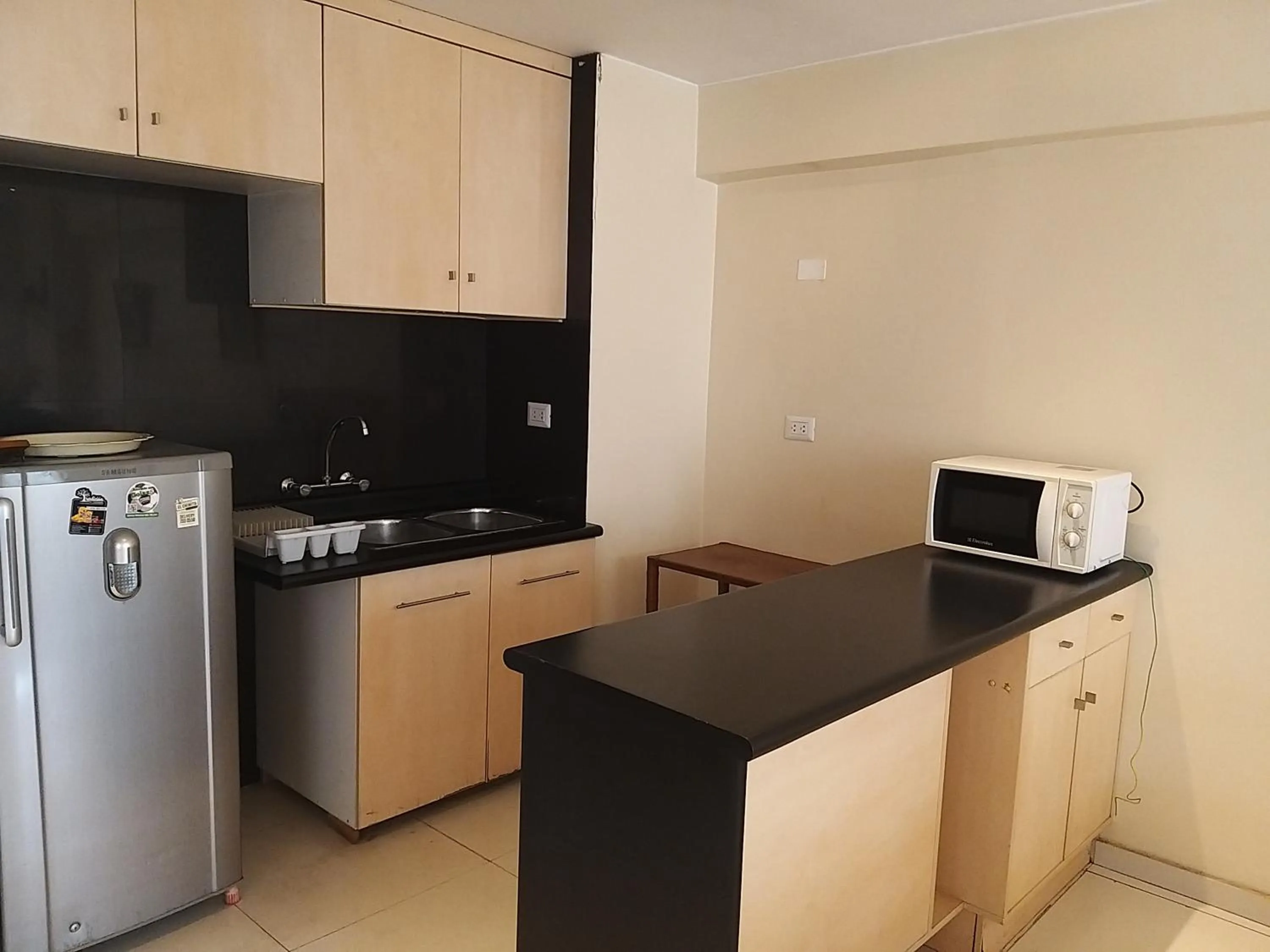 Kitchen or kitchenette in Suite Service Apart Hotel