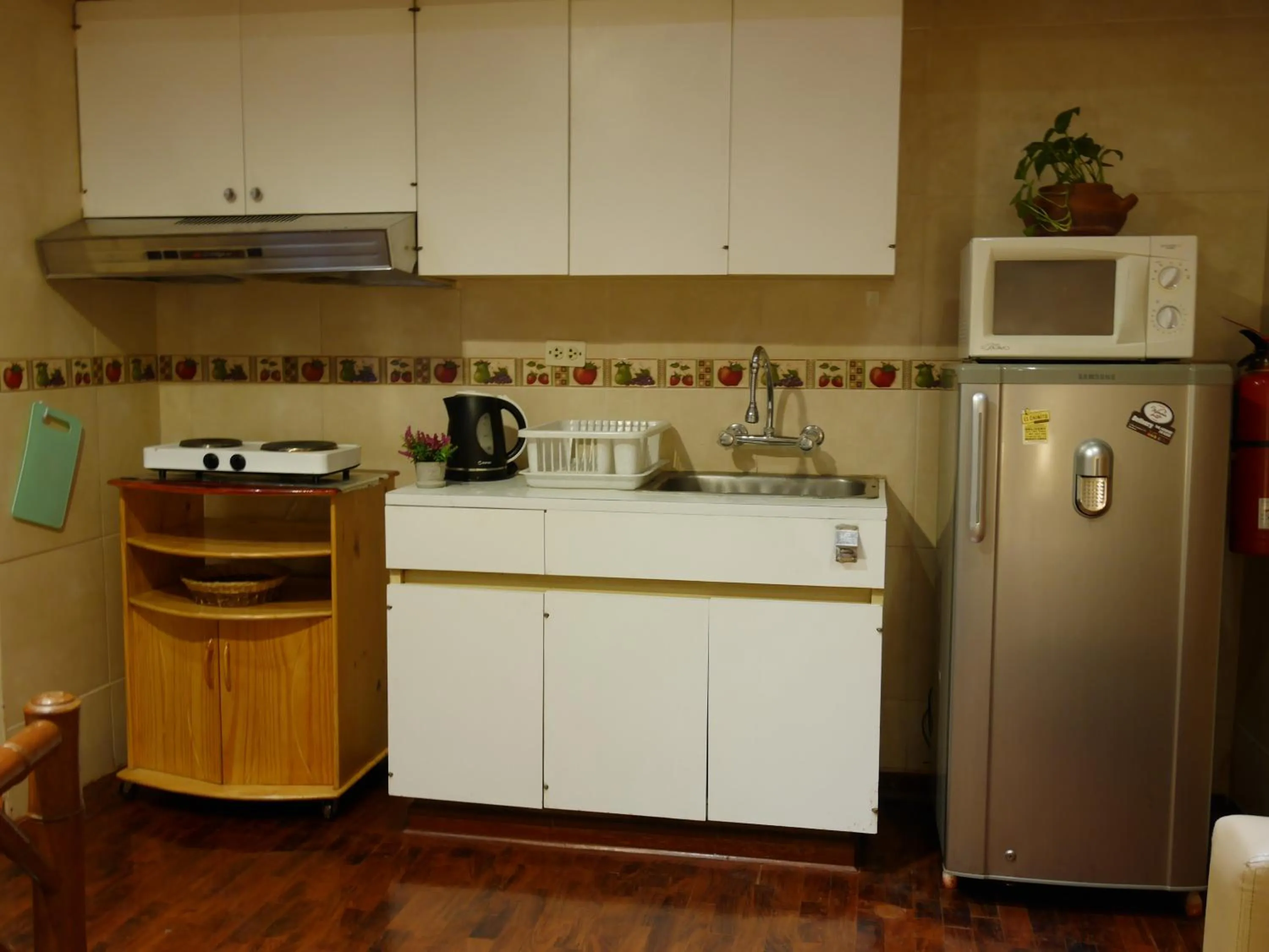 Kitchen or kitchenette in Suite Service Apart Hotel
