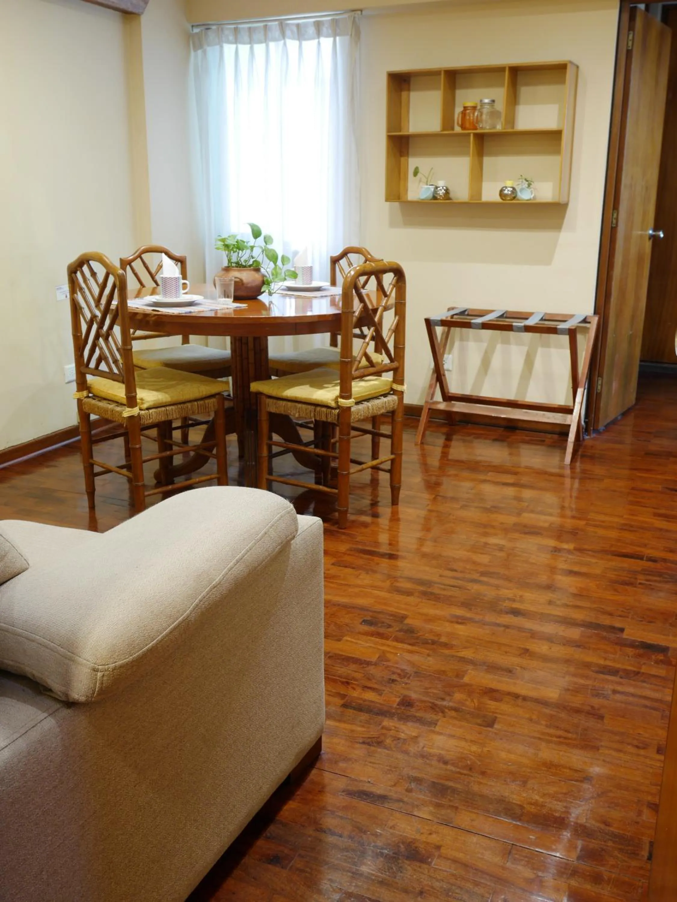Seating area in Suite Service Apart Hotel